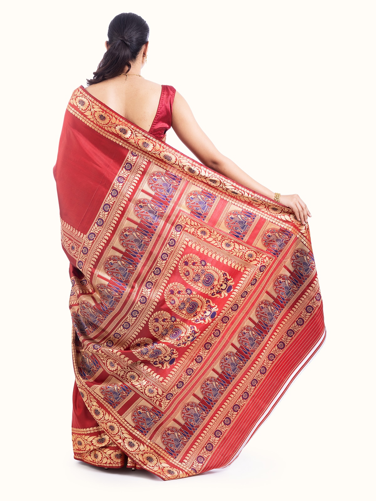 Detailed view of red mulberry silk Baluchari saree emphasizing the richness of the fabric and embroidery