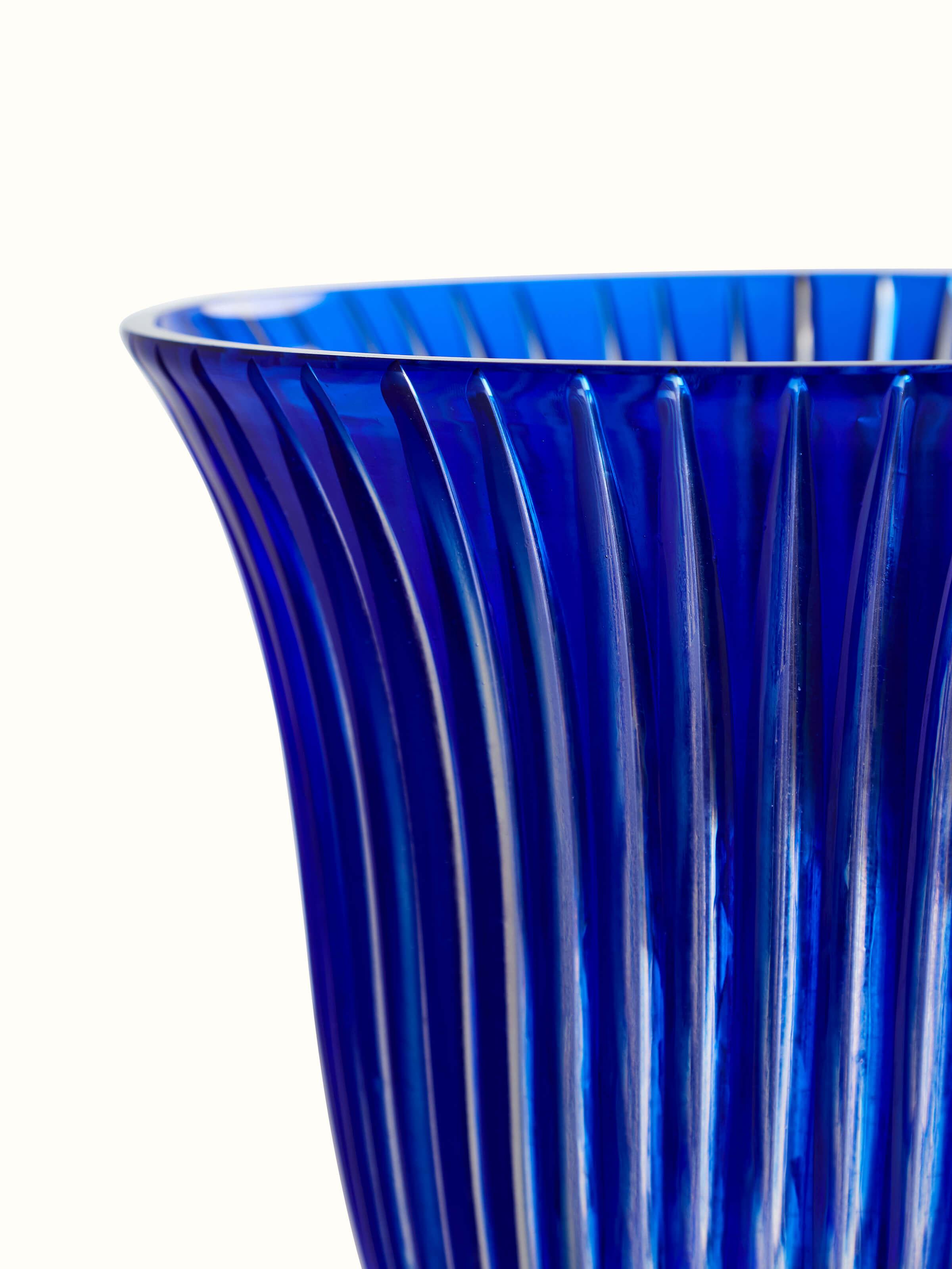 Close-up view of Blue Glass Table Vase focusing on the texture and clarity of the blue glass