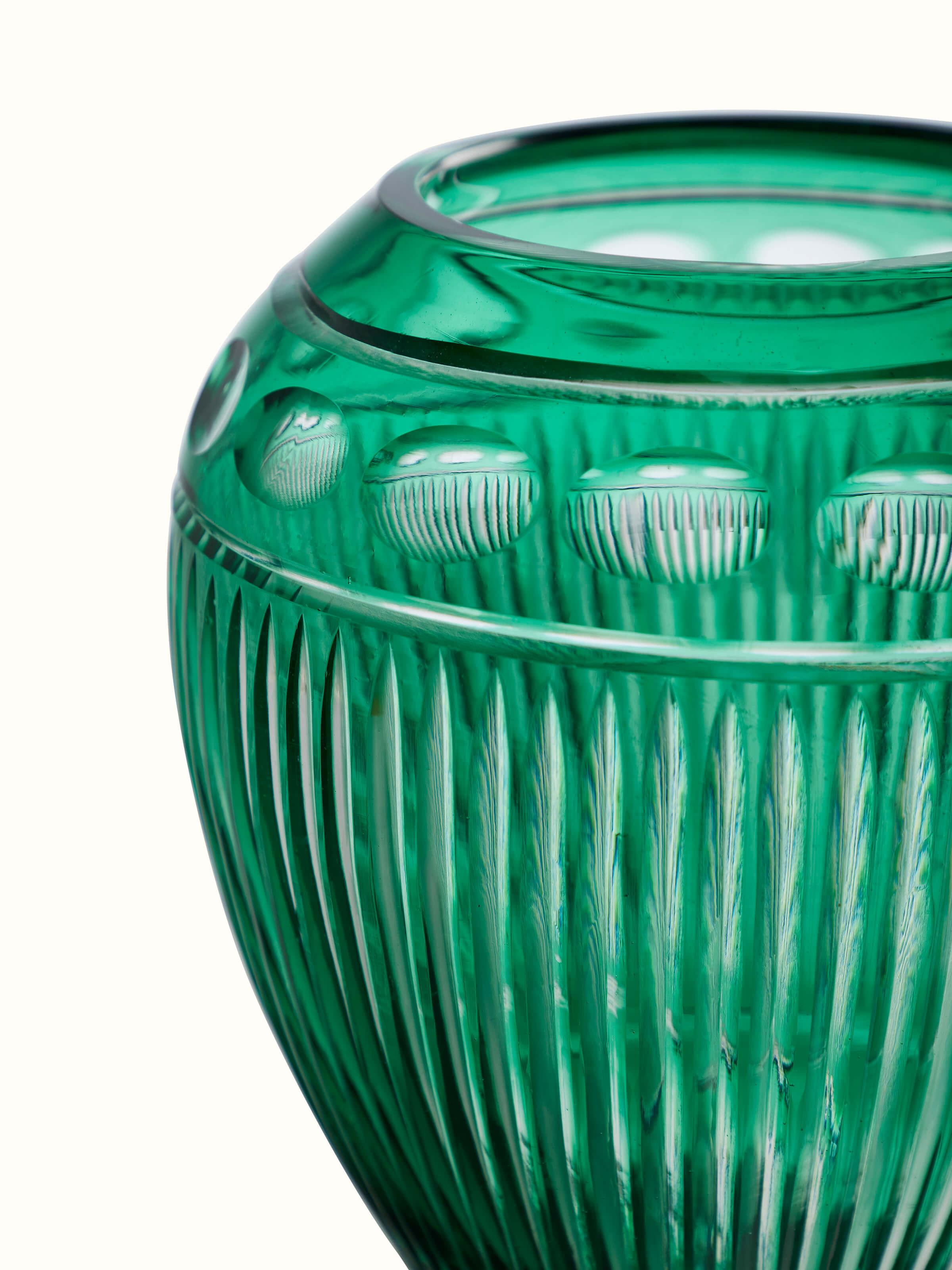 Side view of Green Glass Table Vase highlighting its smooth contours and glass finish.