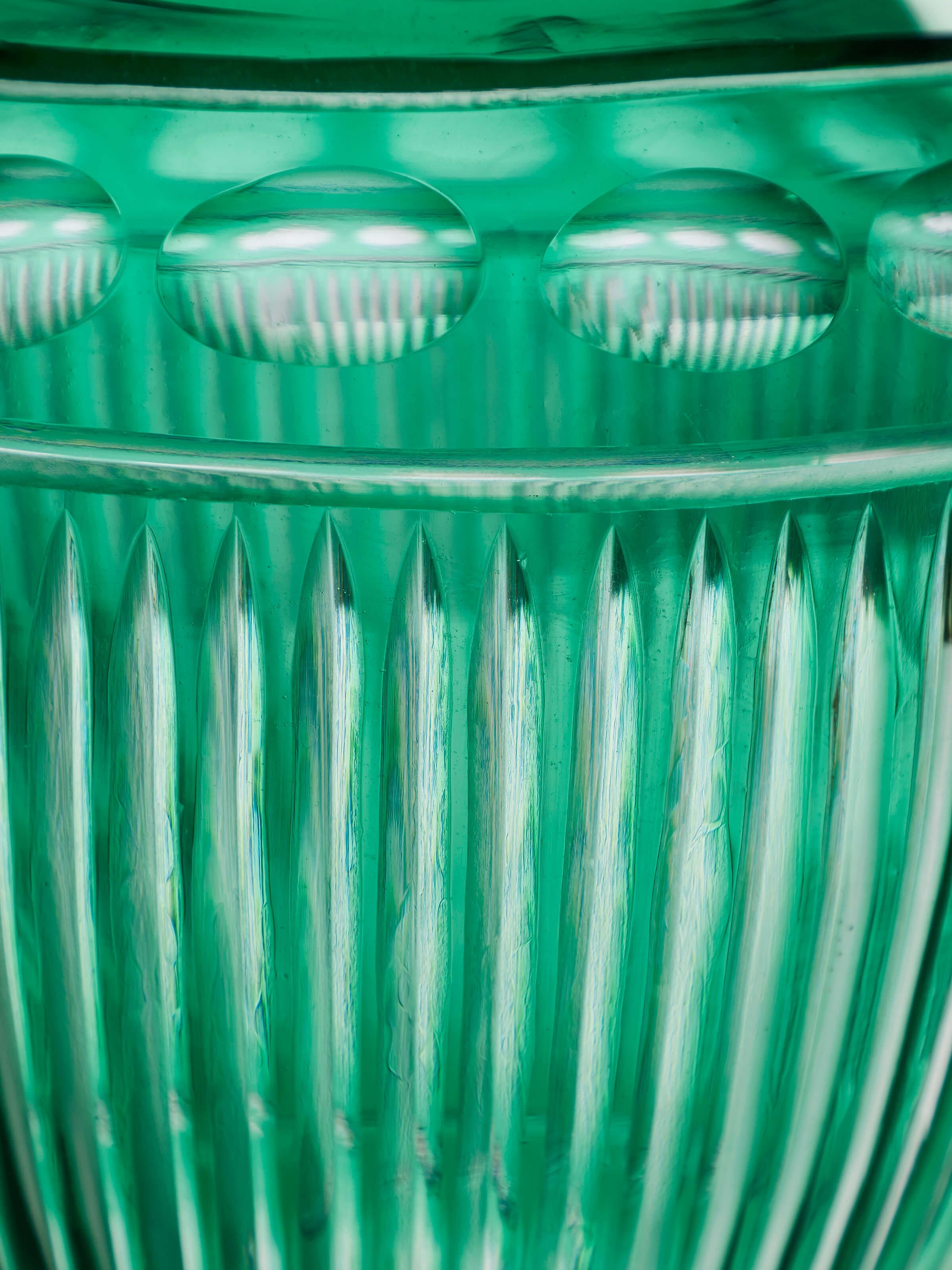Detail view of Green Glass Table Vase showing its glass texture and subtle design details.