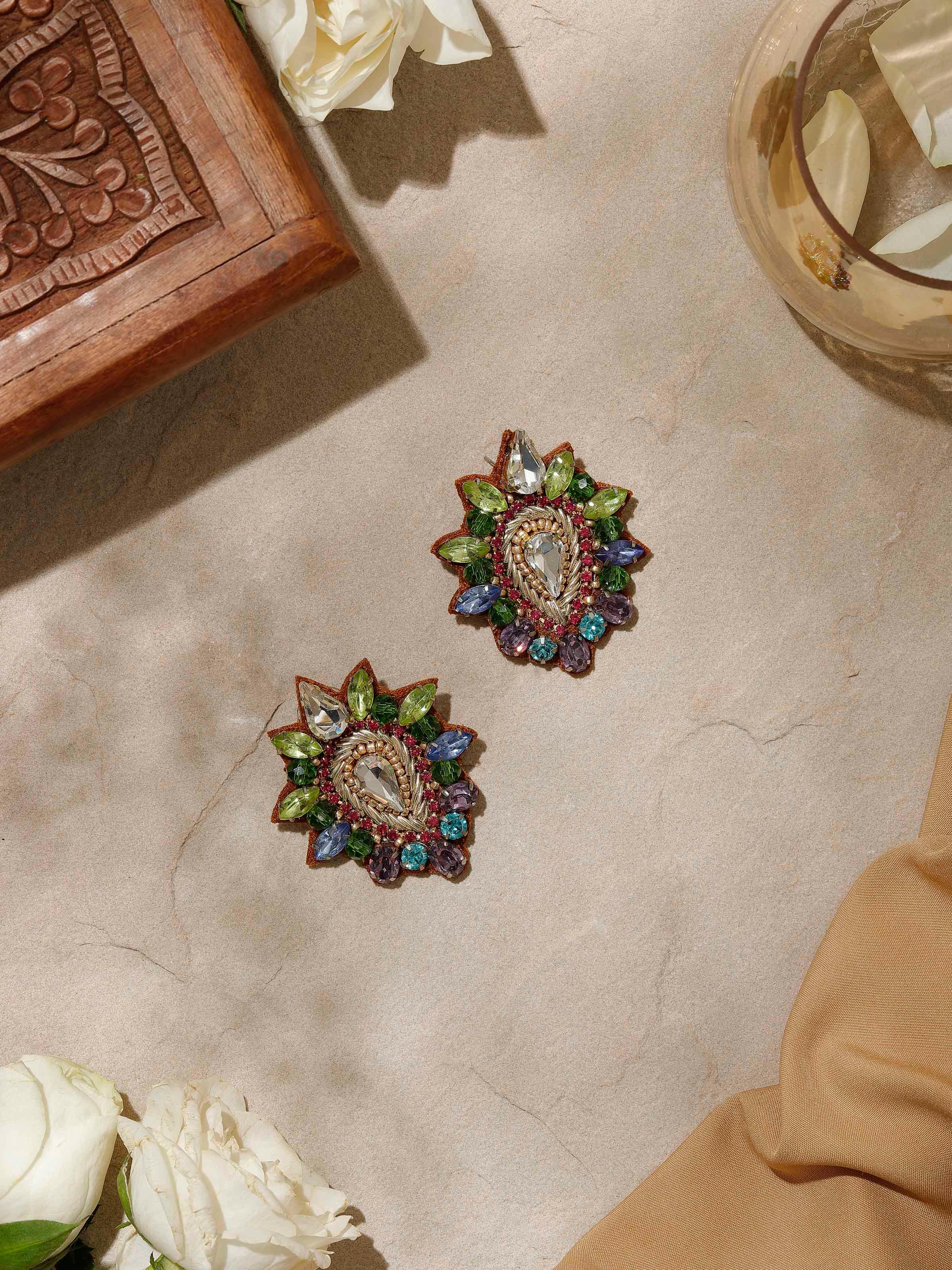 Angled view of Handcrafted Stud Earrings showcasing detailed design by Swadesh