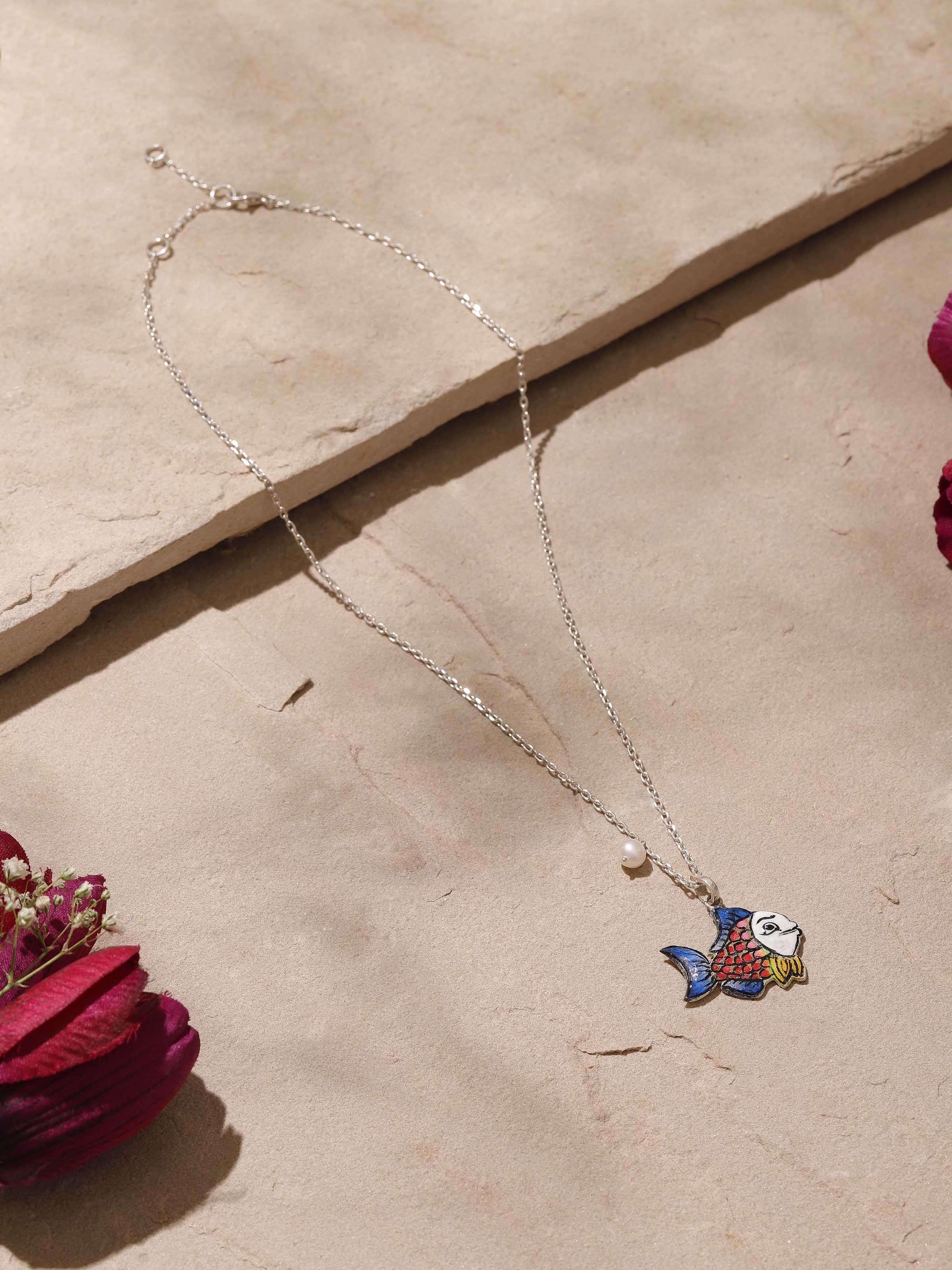 Alternate side view of Gulabi Meenakari silver pendant and chain displaying intricate pink meenakari and graceful silhouette