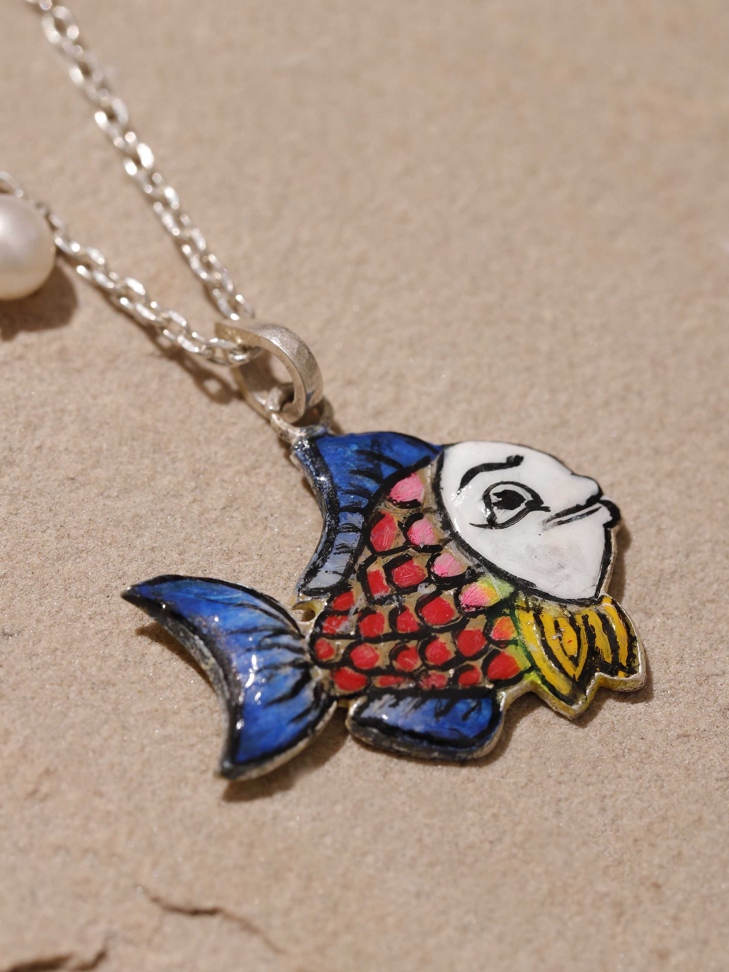 Detailed view of Gulabi Meenakari silver pendant and chain emphasizing fine hand-painted artistry and polished finish