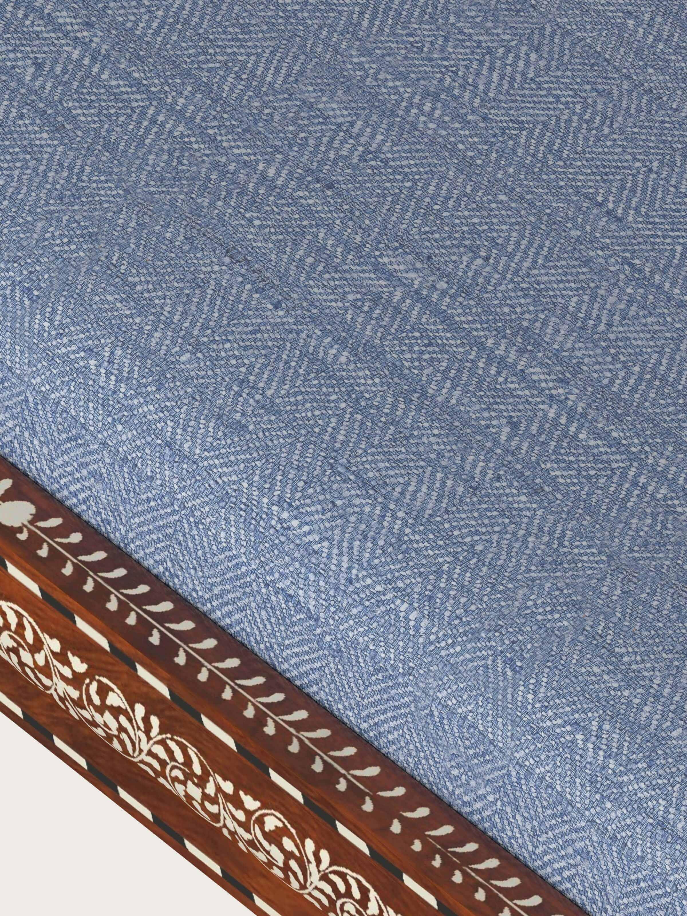 Top view of Blue Chevron Fabric Sheesham Wood & Bone Inlaid Bench, showing the textured chevron fabric and wood detailing