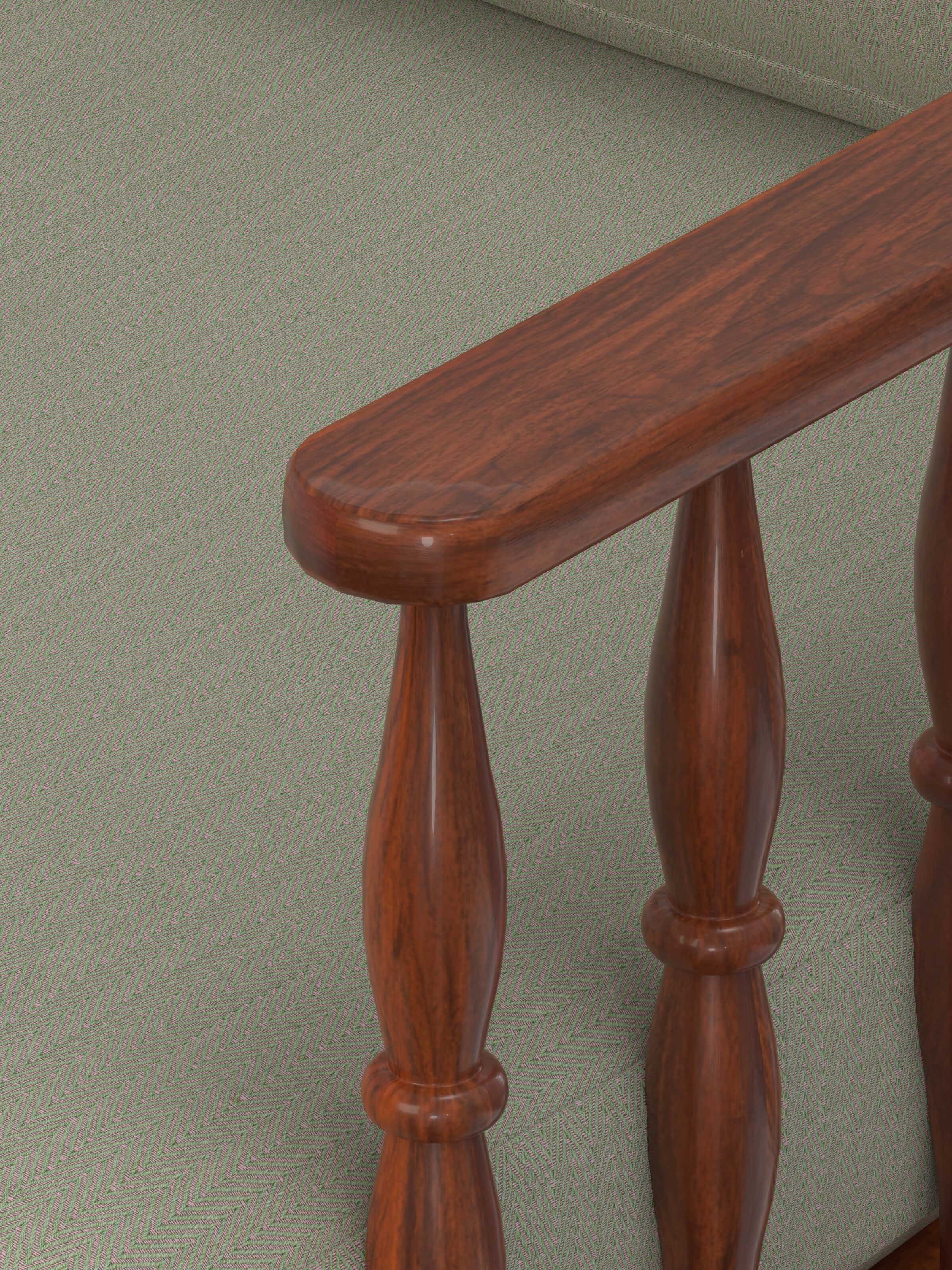 Angled view of the green chevron fabric upholstered Sheesham wood 1-seater sofa, showing the detailed upholstery and wood finish