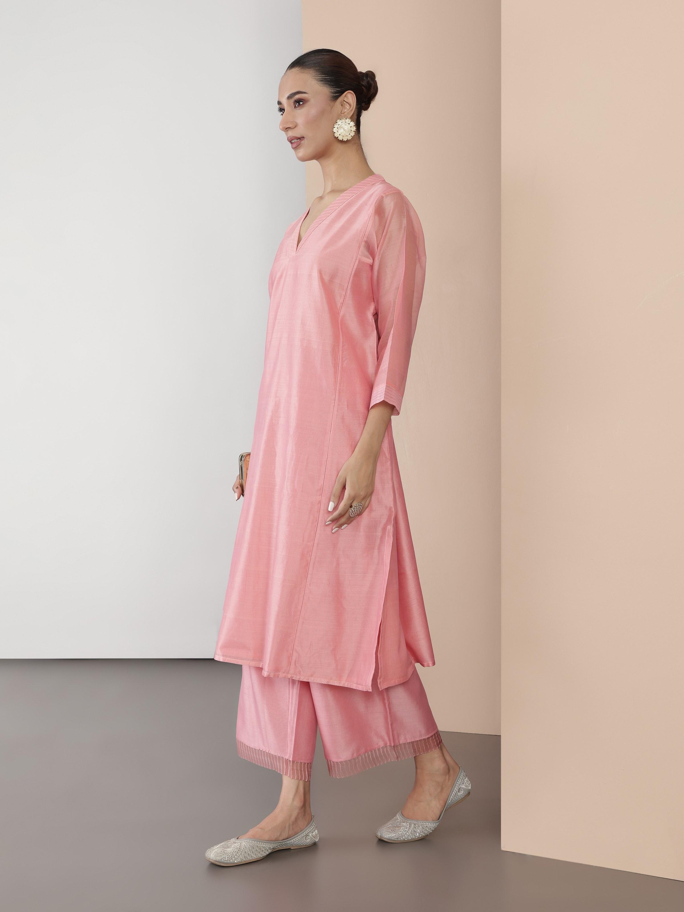 Side view of pink cotton silk kurta highlighting the soft texture and minimalist design.