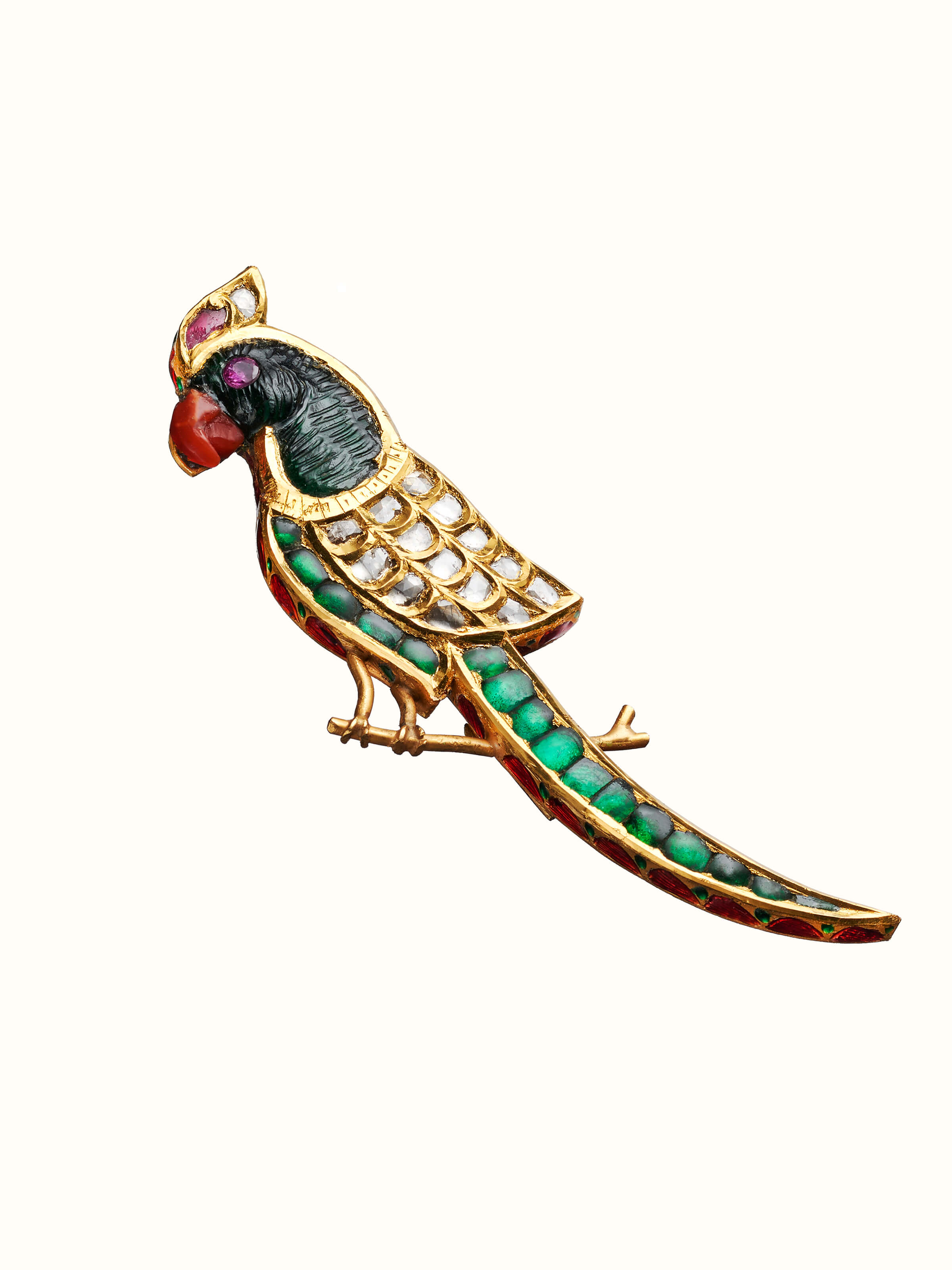 angled view of jadau gold brooch pin