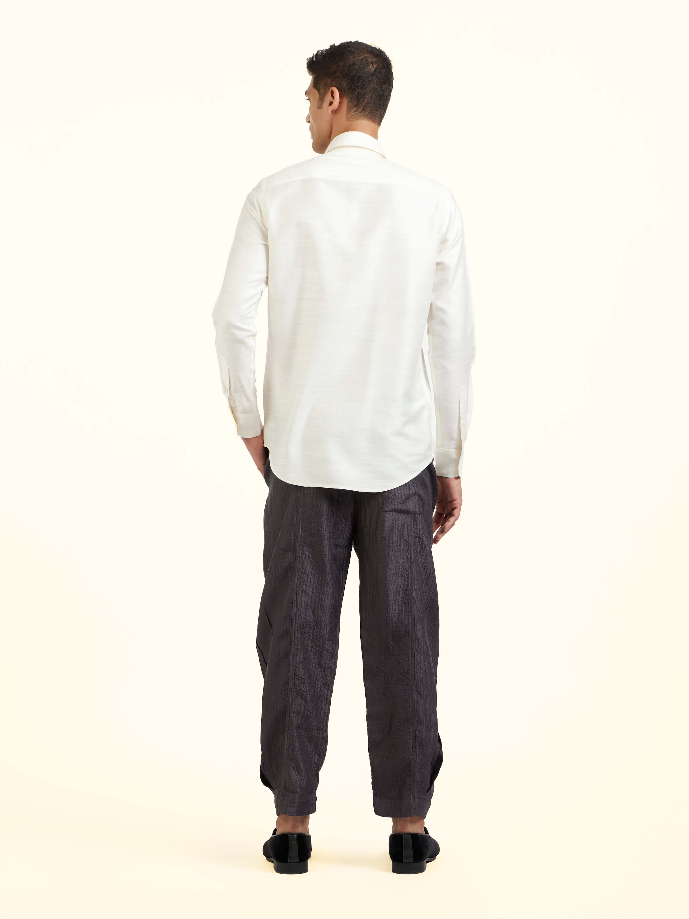 Back view of white hand embroidery shirt displaying neat finish and classic silhouette