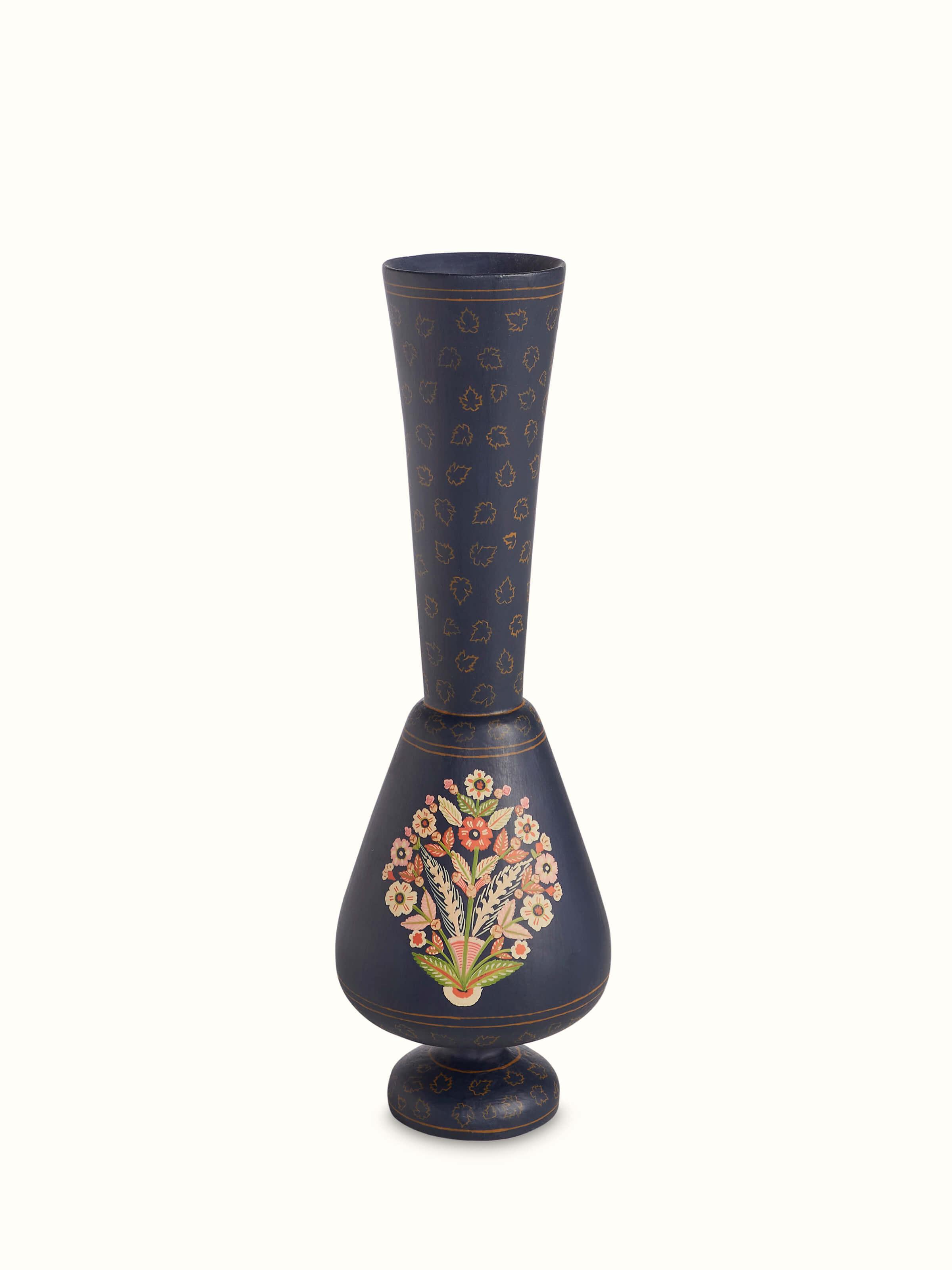 Front view of Papier-mache table vase in multicolor displaying vibrant patterns