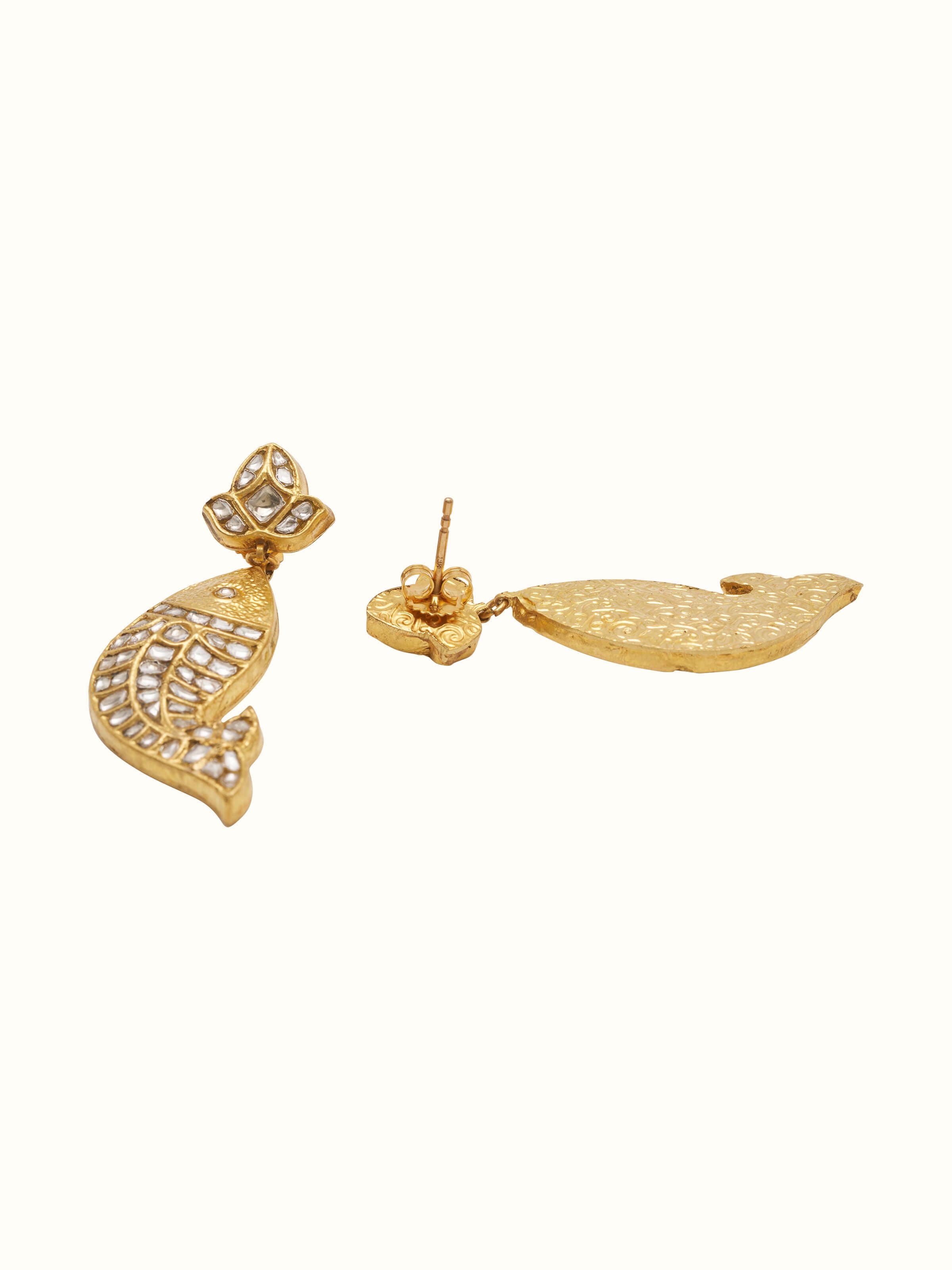 Angled view of Thappa 22 Karat Gold Drop Earrings emphasizing the elegant curves and gold sheen.