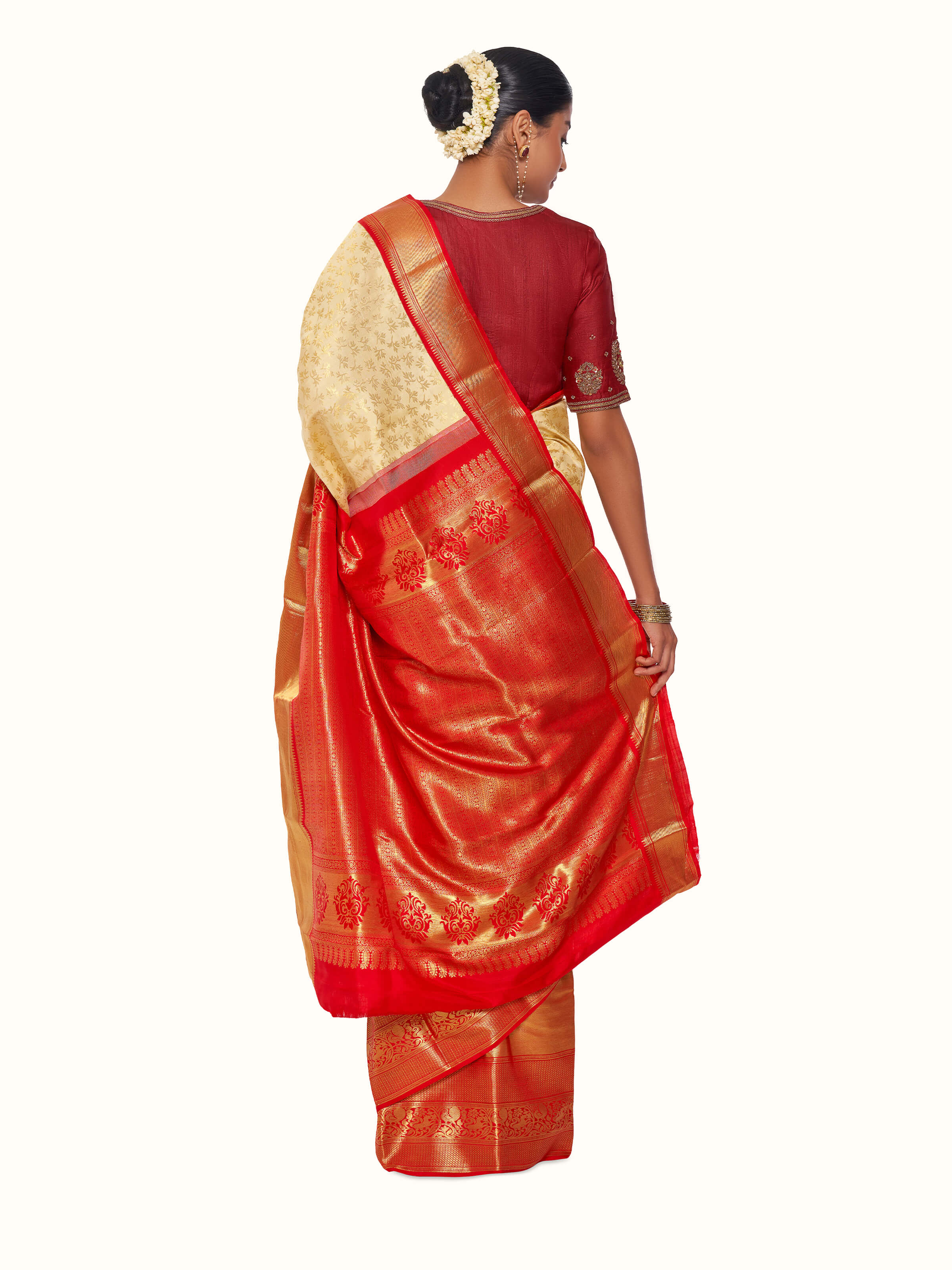 Back view of off-white silk Dharmavaram saree with richly woven pallu