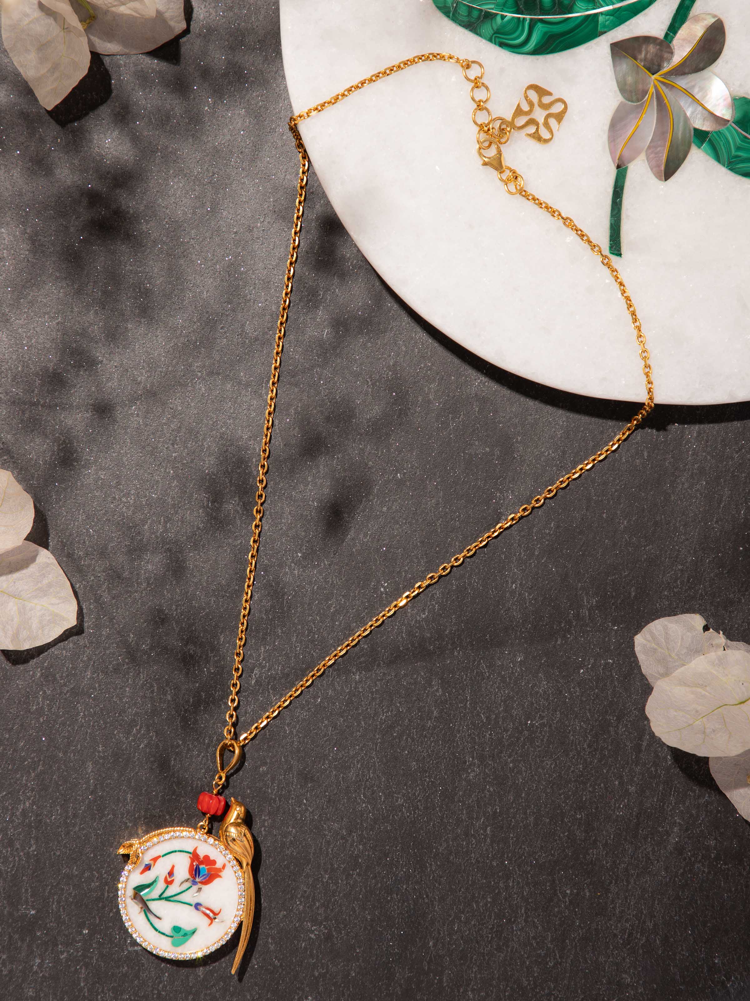 Lifestyle view of Parchinkari silver pendant styled with a traditional outfit, showcasing subtle elegance.