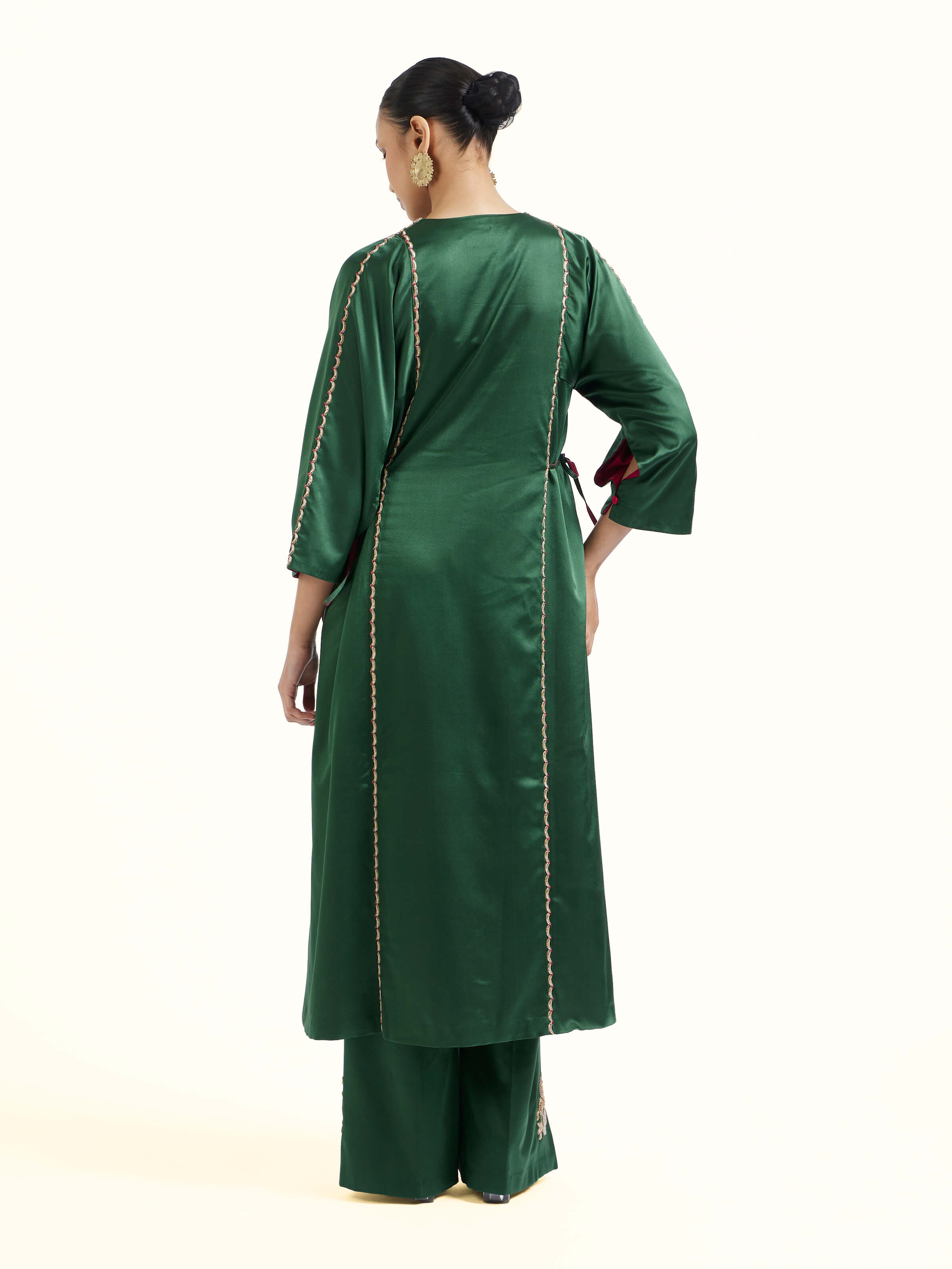 Back view of emerald green silk Banarasi co-ord set displaying complete ensemble