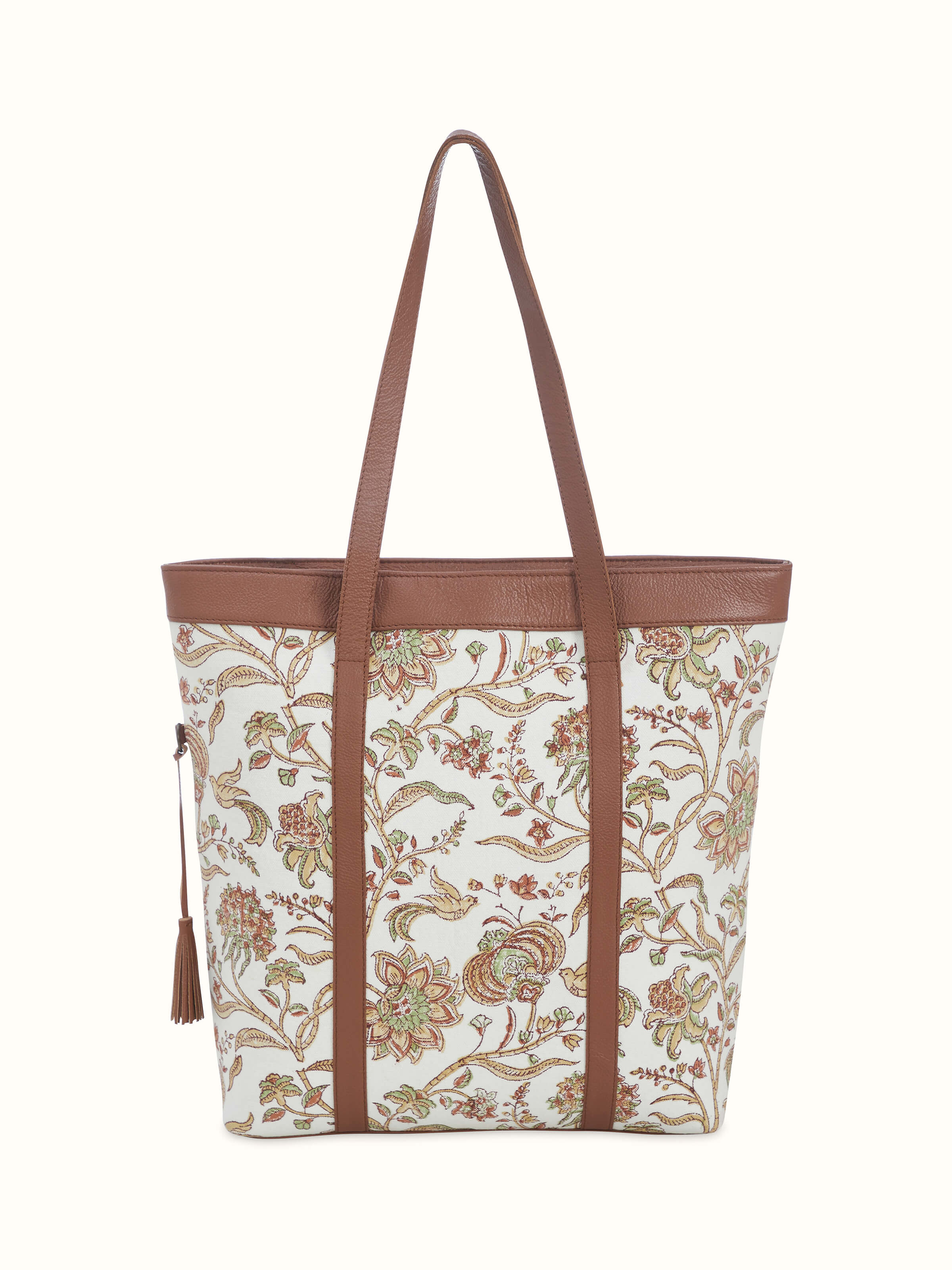 Back view of mustard leather and textile hand block printed tote bag displaying stitching and finish.