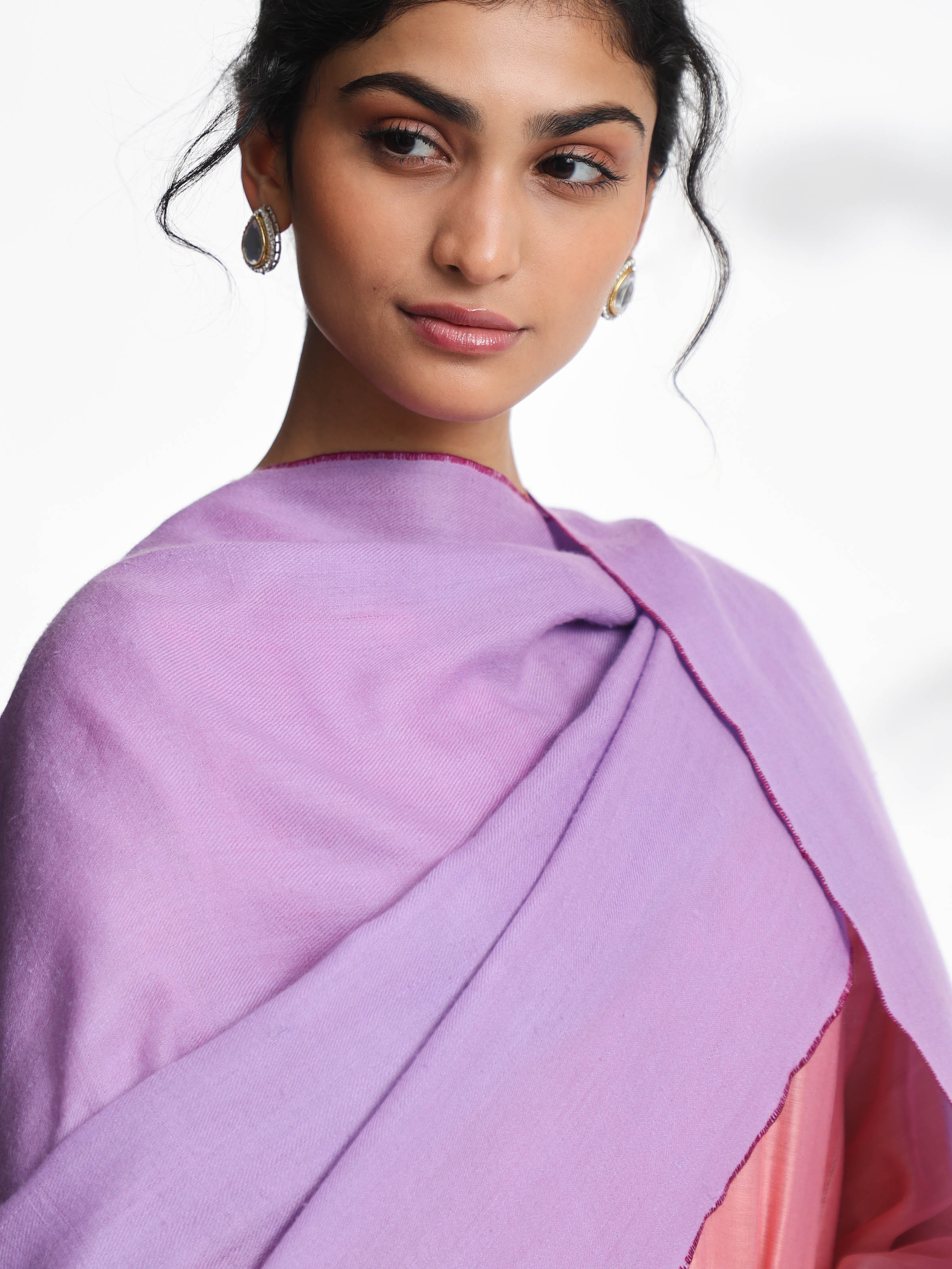 Second alternate side view of purple cashmere kaaj embroidered handwoven stole emphasizing weave