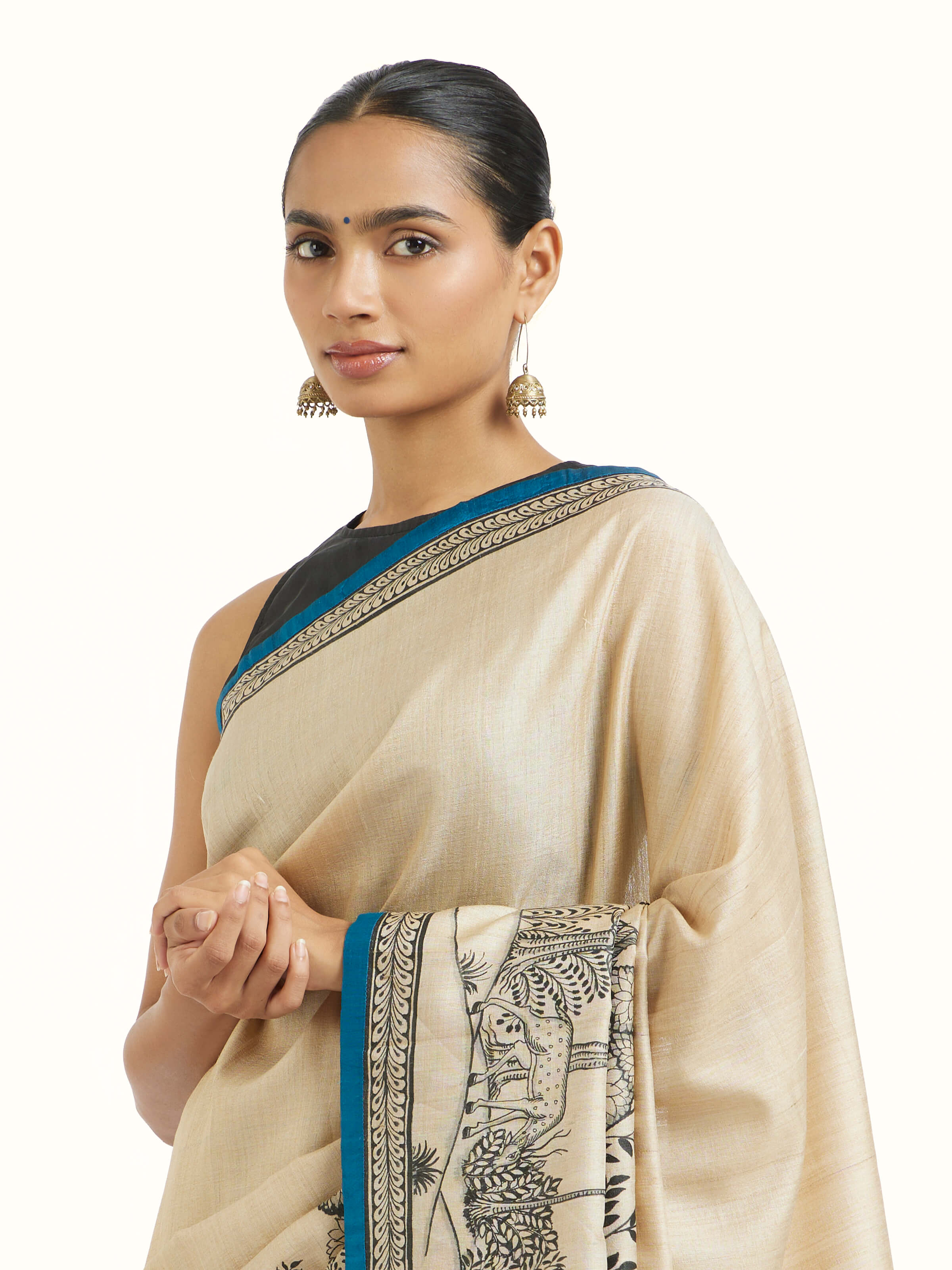 Angled view of tussar silk Pattachitra saree emphasizing Pattachitra artwork