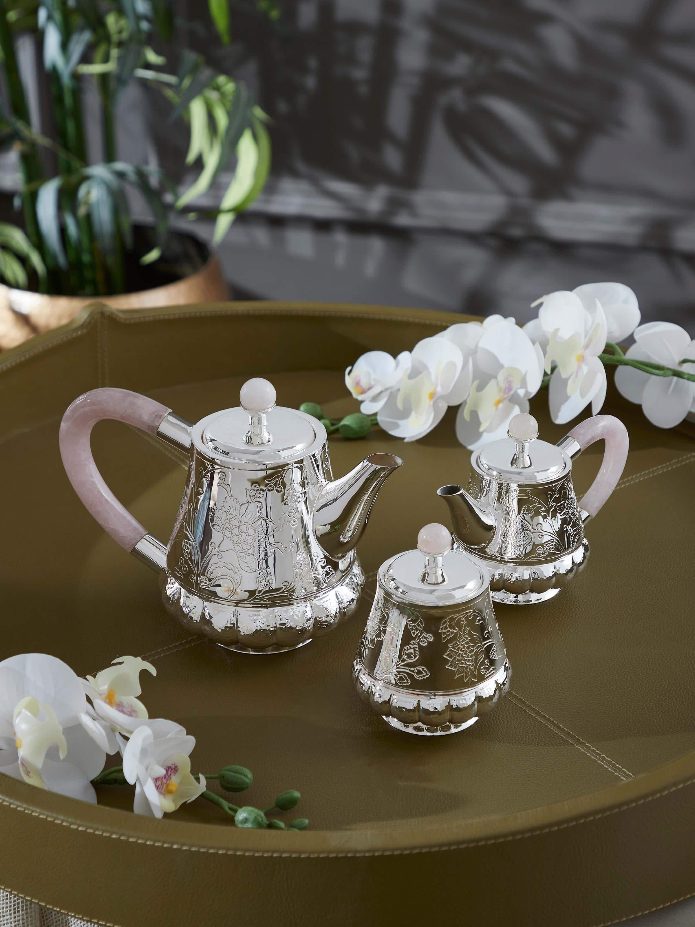 Side view of Kalamkari Silver Tea Set (3 Pcs) from Swadesh, highlighting the traditional design and beautiful silver craftsmanship.