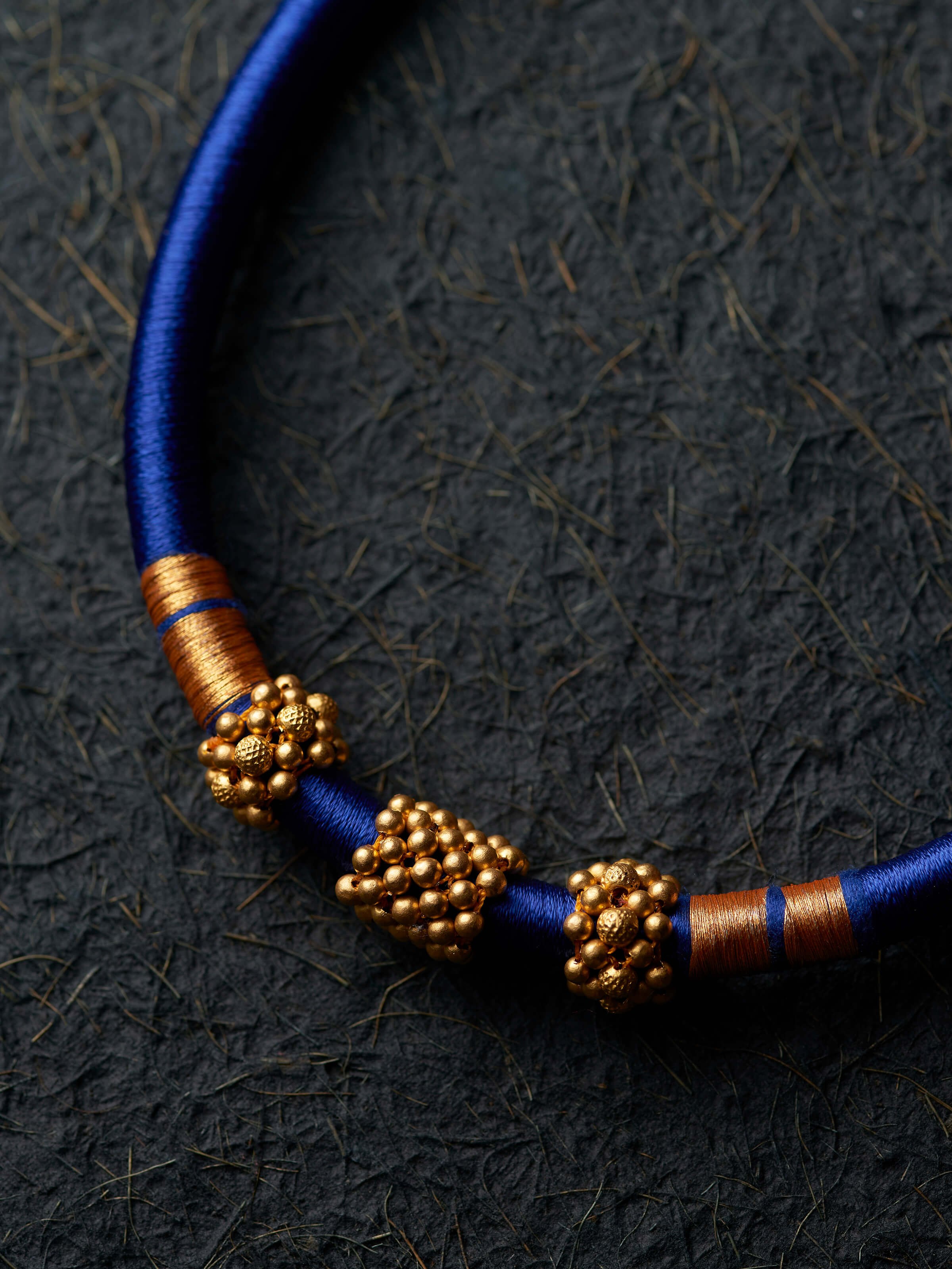 Close-up of craftsmanship on Thushi 22 karat collar necklace