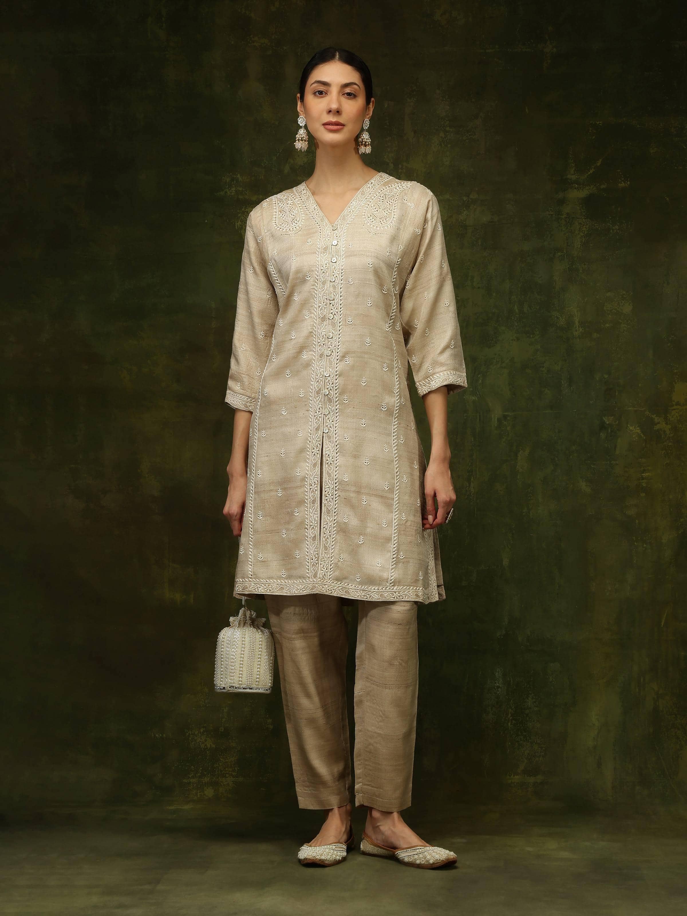 Lifestyle shot reflecting the sophisticated appeal and subtle shine of tussar silk.