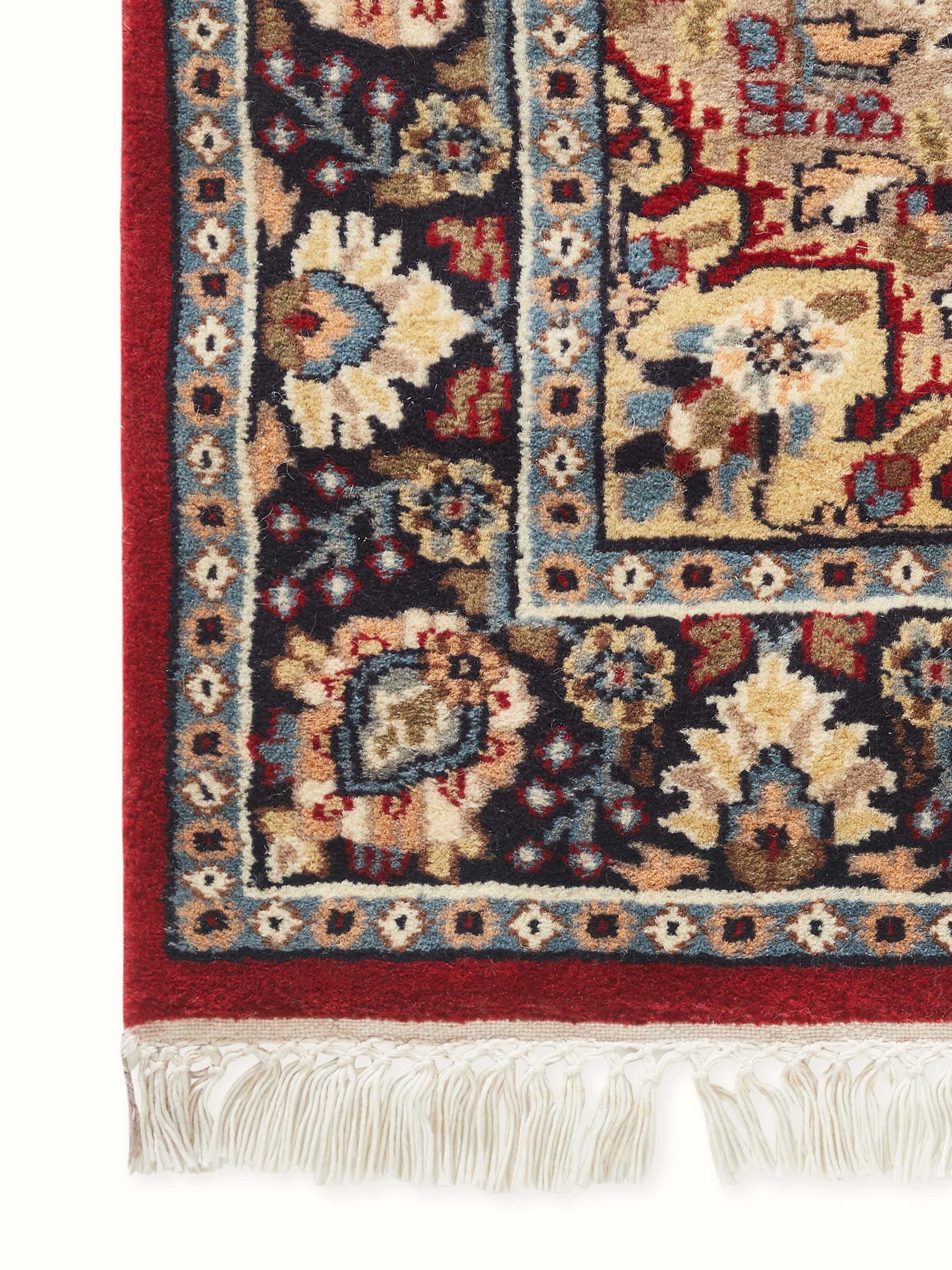 Detailed side shot emphasizing the dense wool pile and hand-knotted craftsmanship