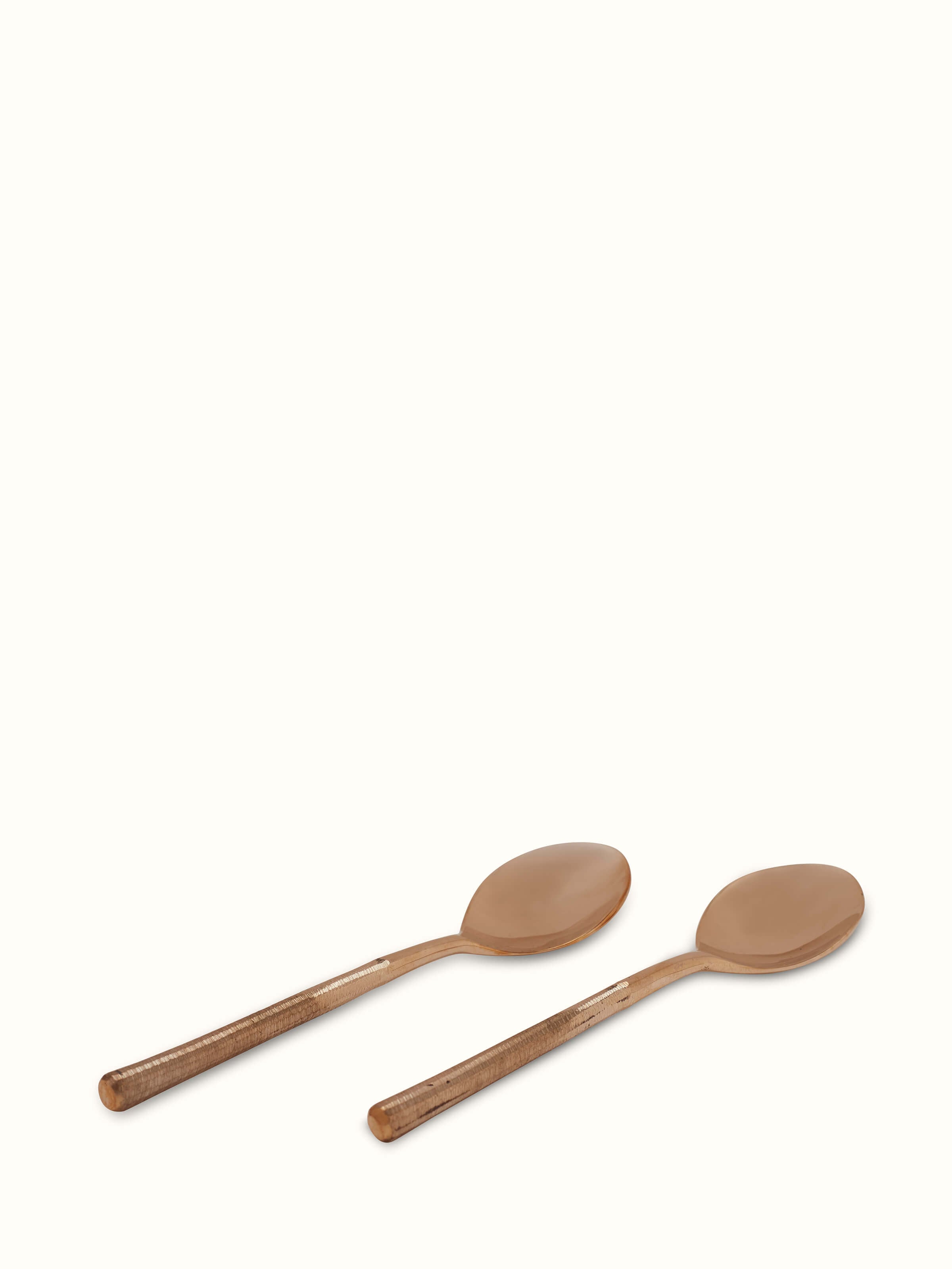 Close-up of Bell metal teaspoon emphasizing fine craftsmanship and shine