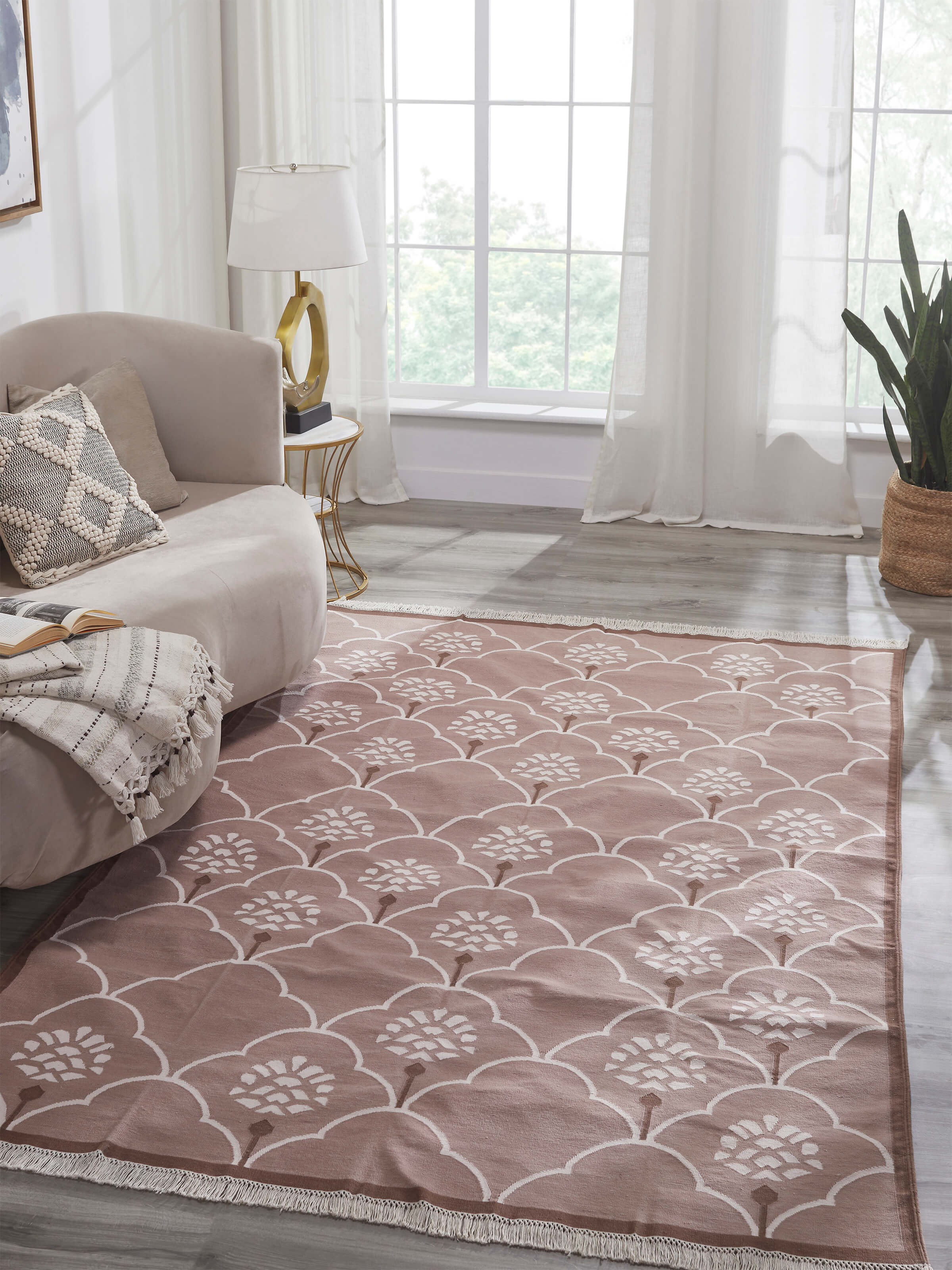 Side view of Stylised floral beige lawan cotton panja dhurrie highlighting its traditional design