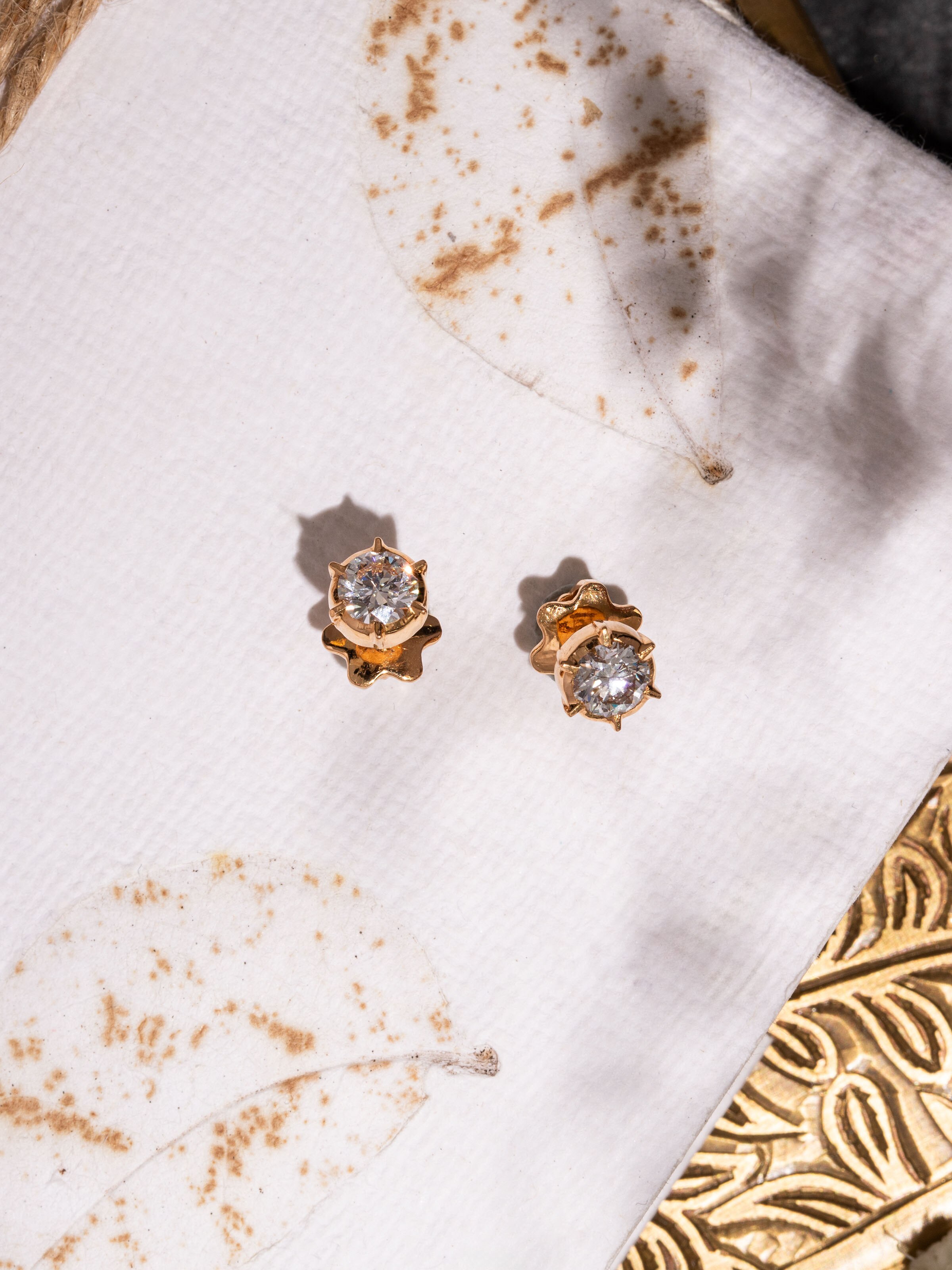 Lifestyle view of Close-setting 22 Karat Gold Studs styled with traditional attire.
