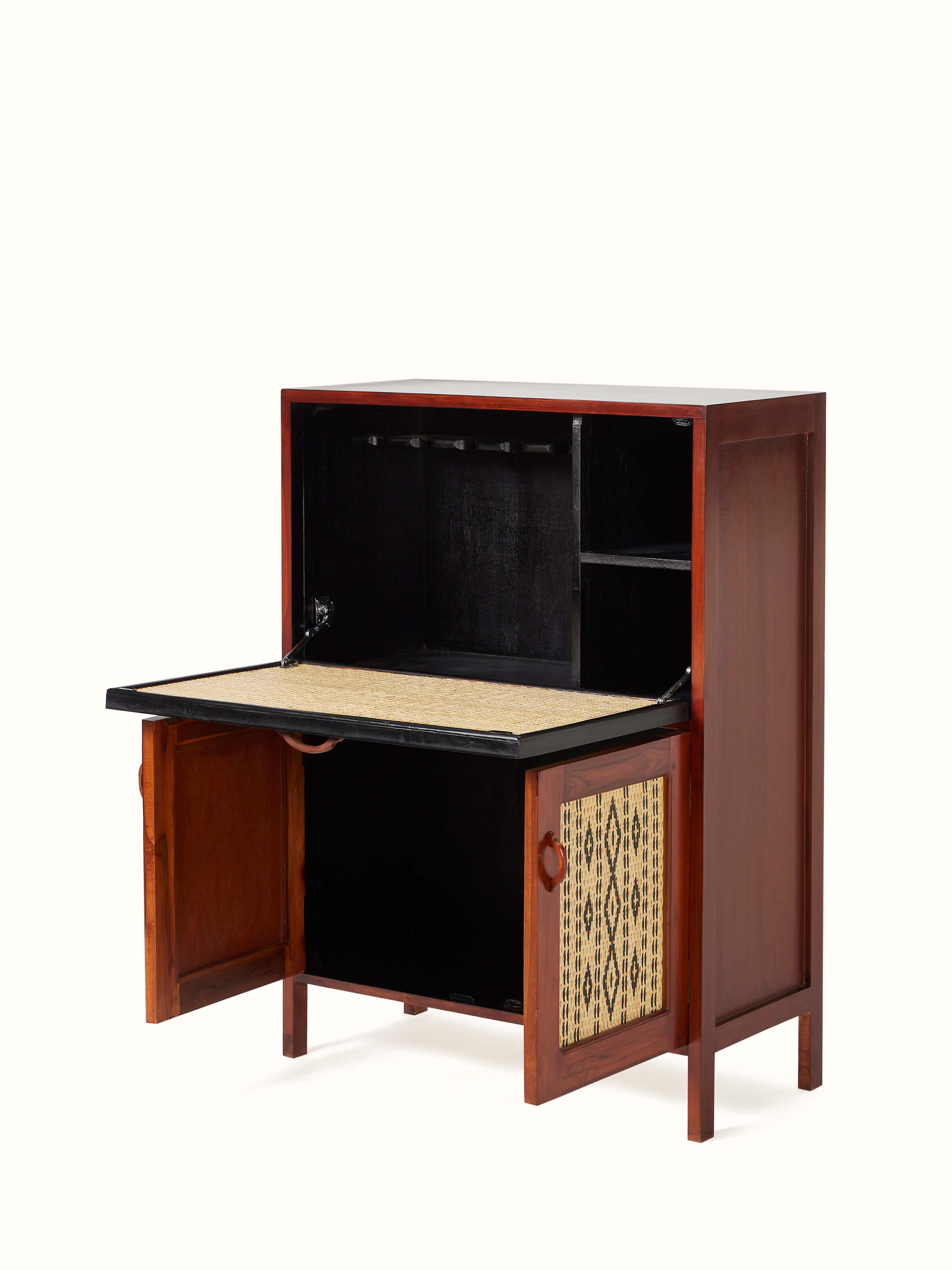 Side view of teak wood and cane bar cabinet, highlighting the cabinet’s design and natural materials.