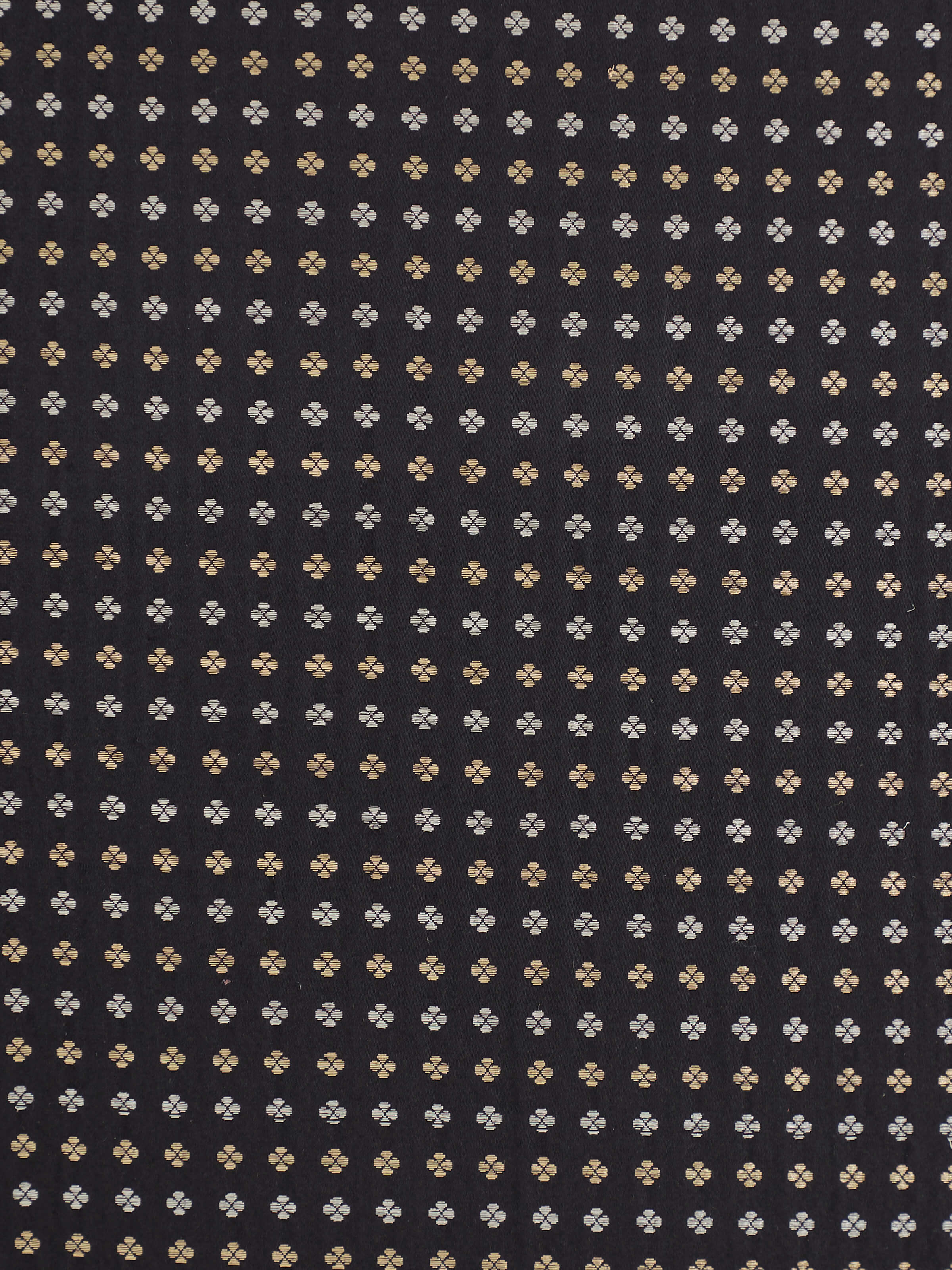 Close-up of Banarasi weave pattern and silk texture on Awadh black striped cushion cover