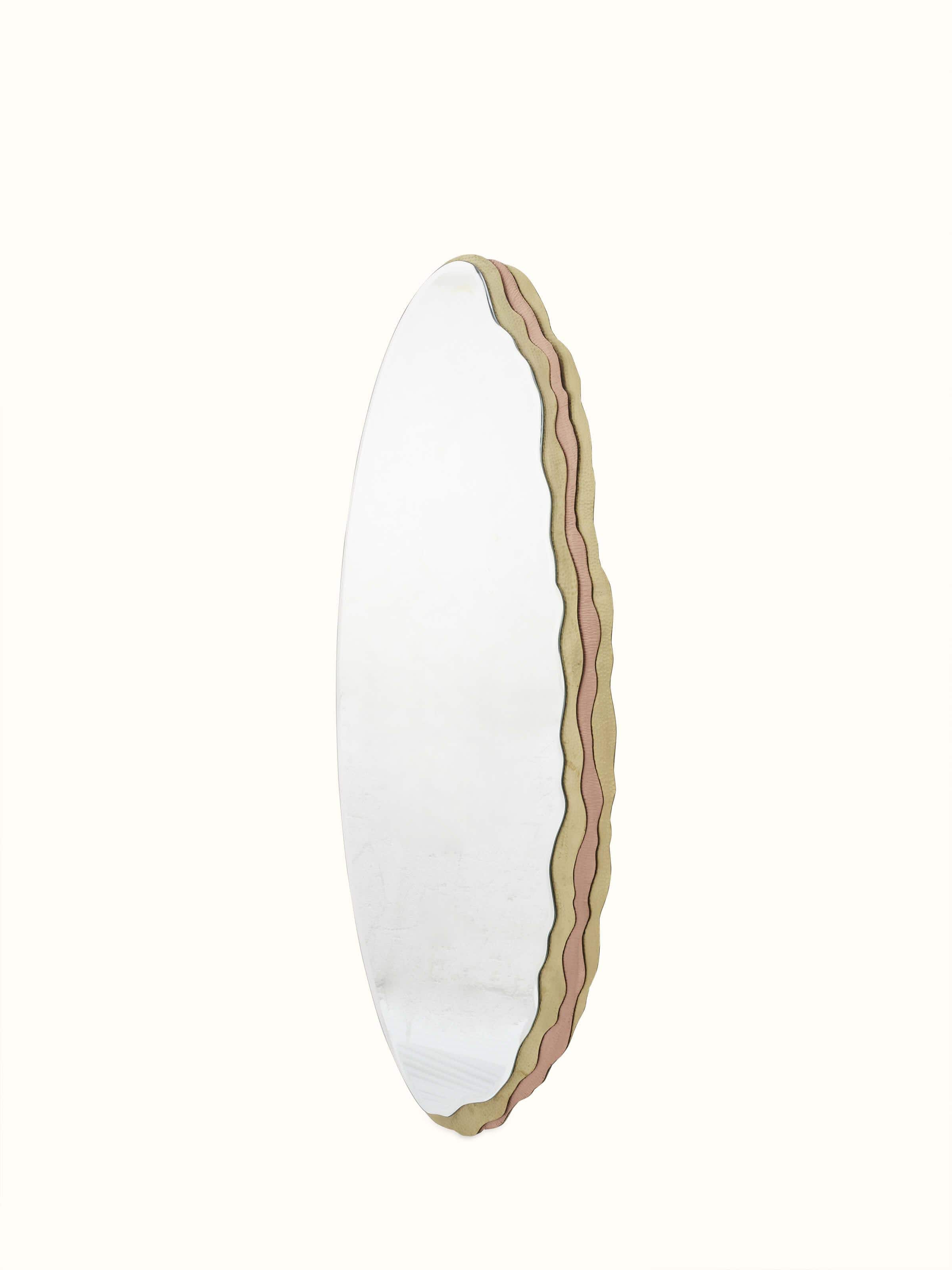 Close-up of the brass detailing on the Thathera full-length mirror, highlighting its intricate design