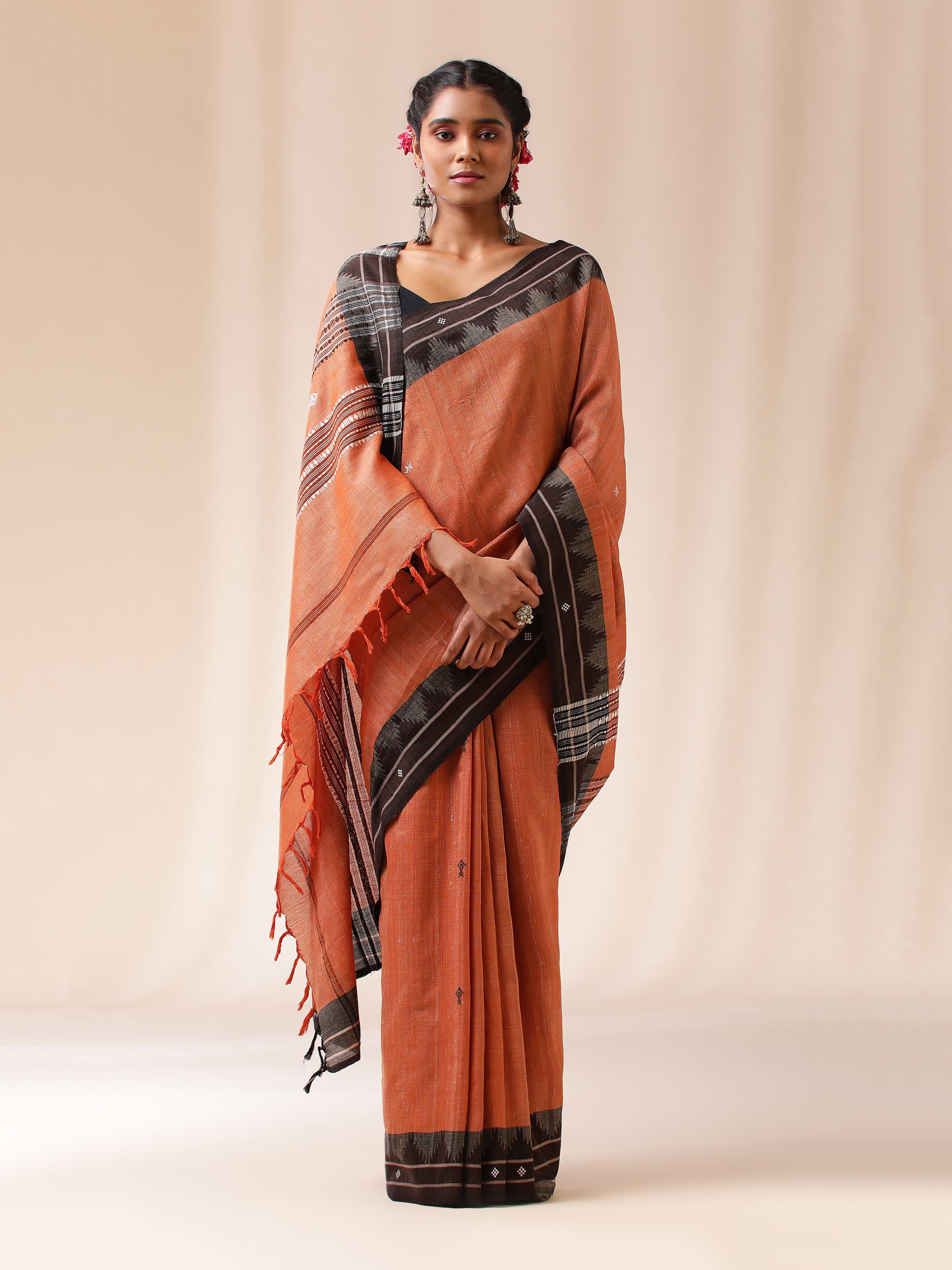 Lifestyle image showcasing the cultural richness and natural texture of the Kotpad weave.