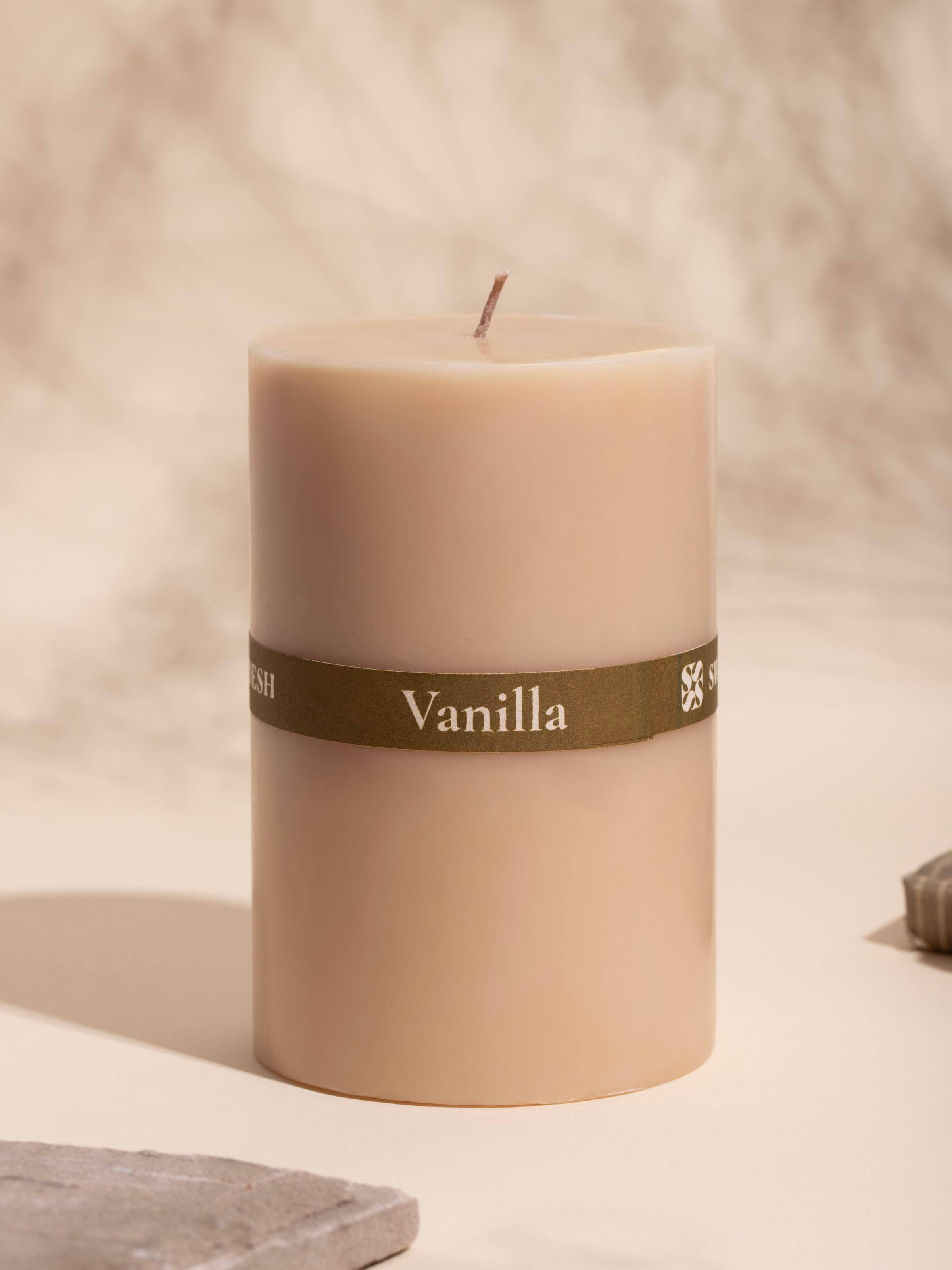 Angled side view of Vanilla Pillar Candle (4.5 inches) showing smooth finish