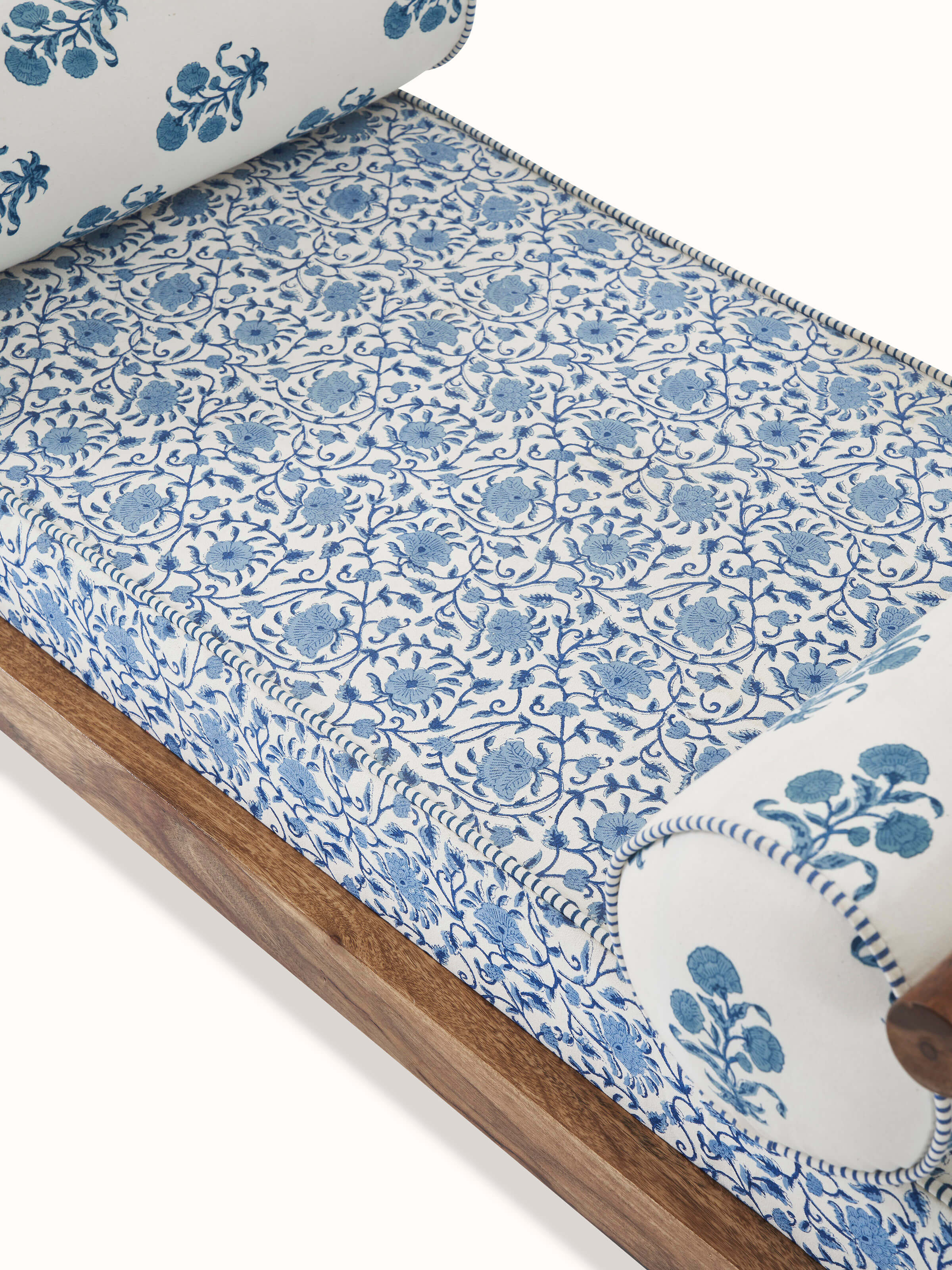 Detailed view of the Sanganeri block print on the Sheesham wood bench