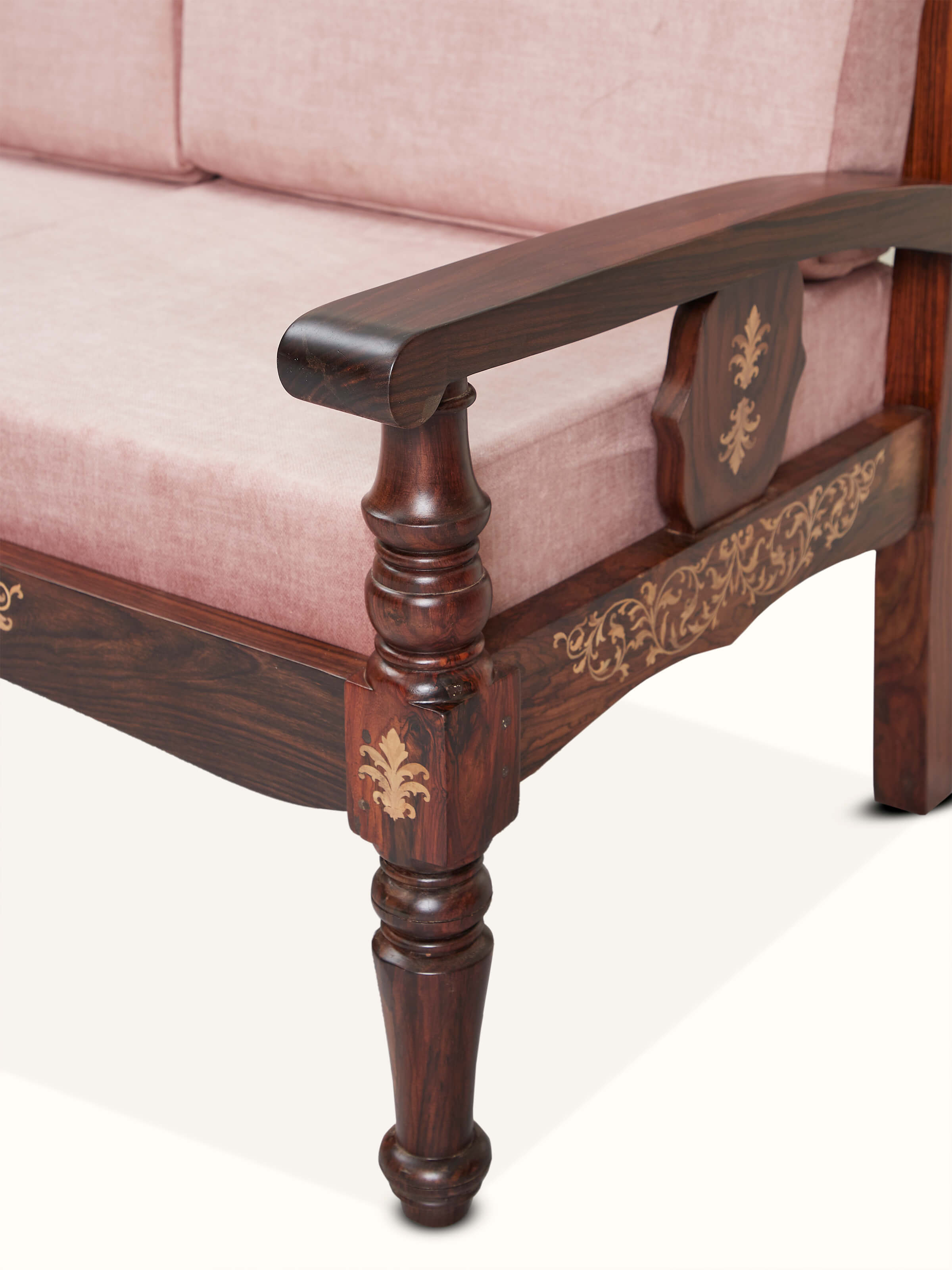 Side view of the upholstered Mysore Rosewood 2-seater sofa, emphasizing the rich wood inlay and elegant design of the piece.