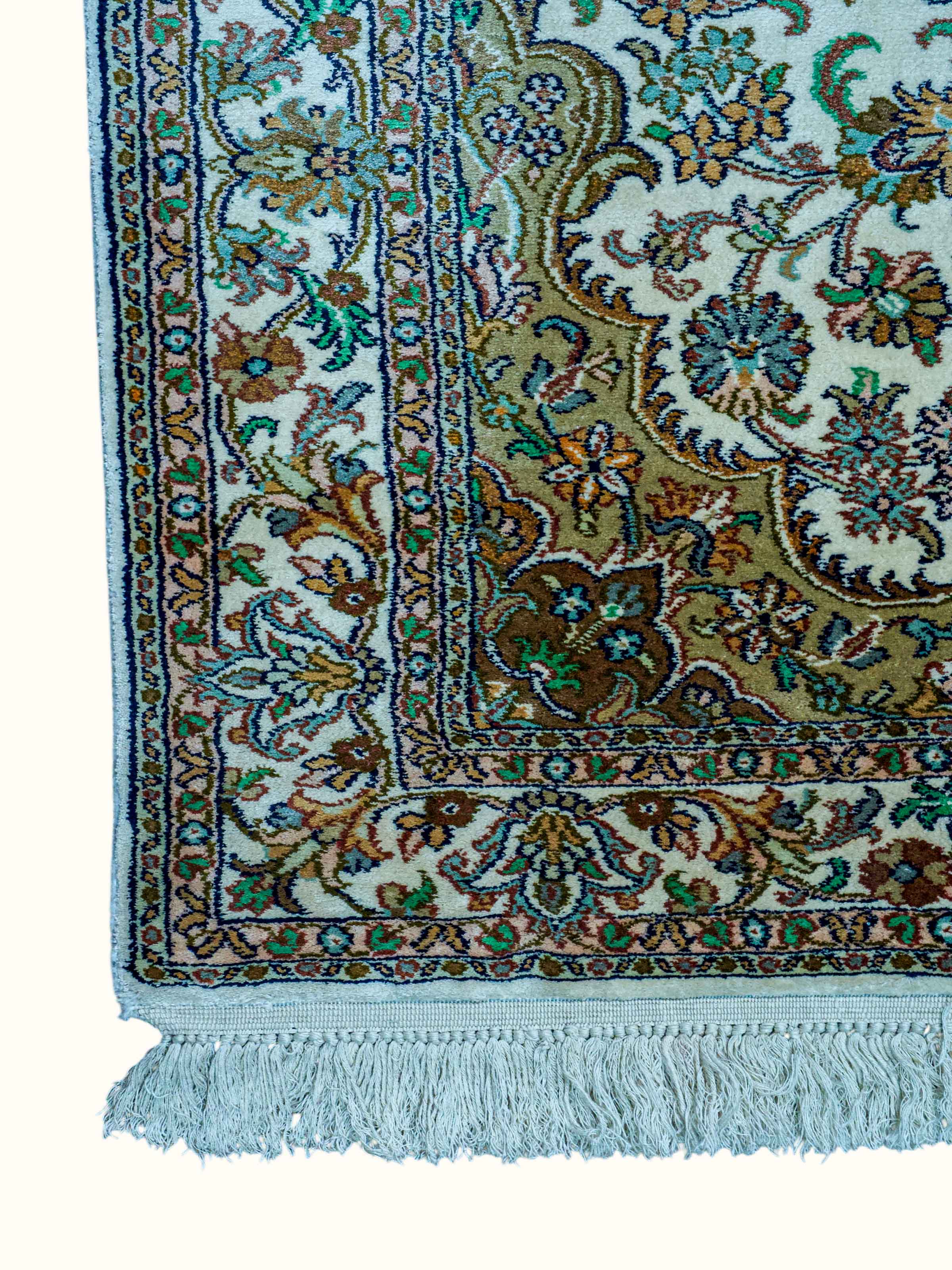 Top view of the Traditional Persian Ivory Green Kashan Kashmir Silk Hand-Knotted Carpet