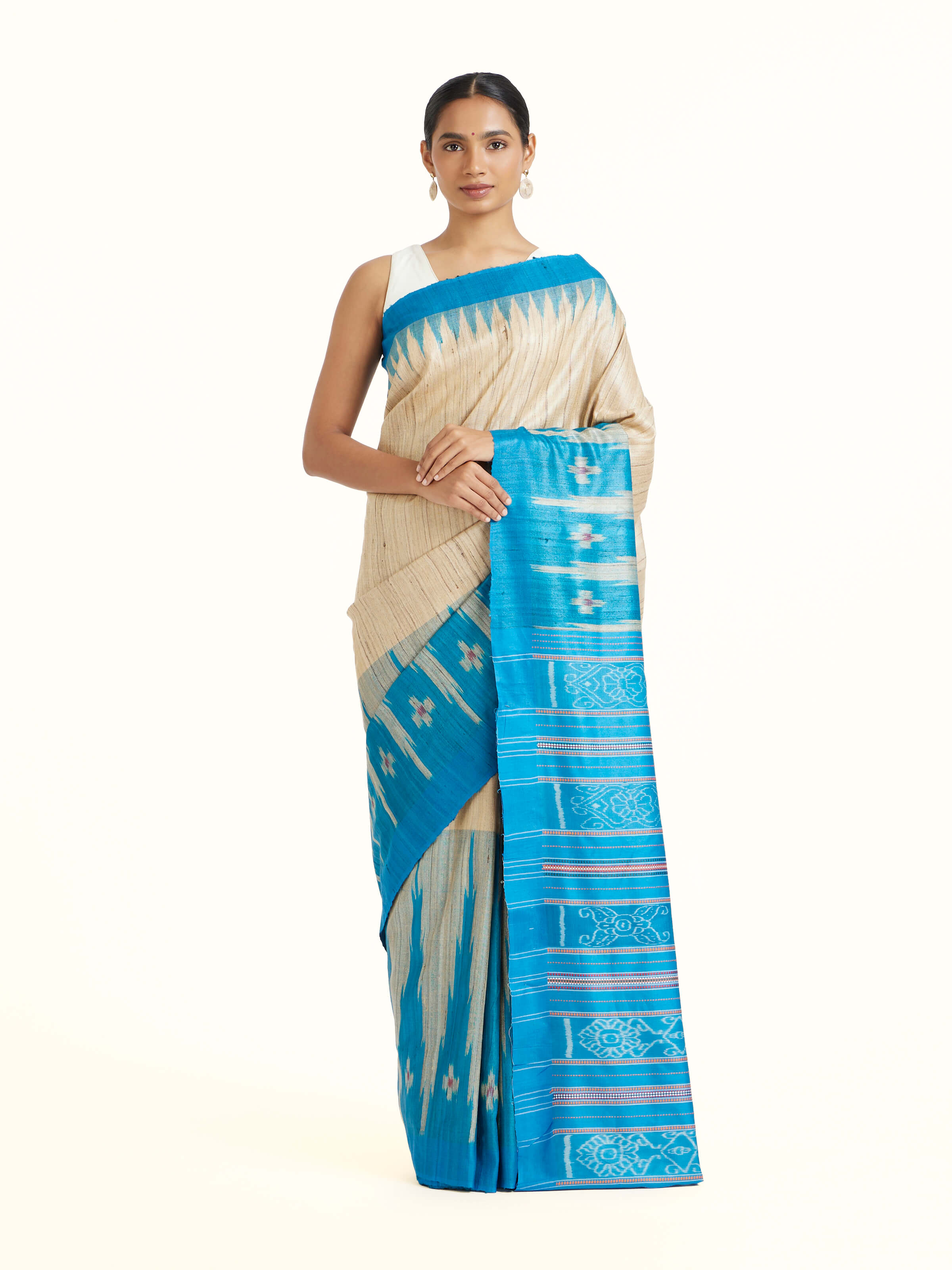 Front view of the Turquoise Tussar Ghicha Silk Bandha Ikat Saree