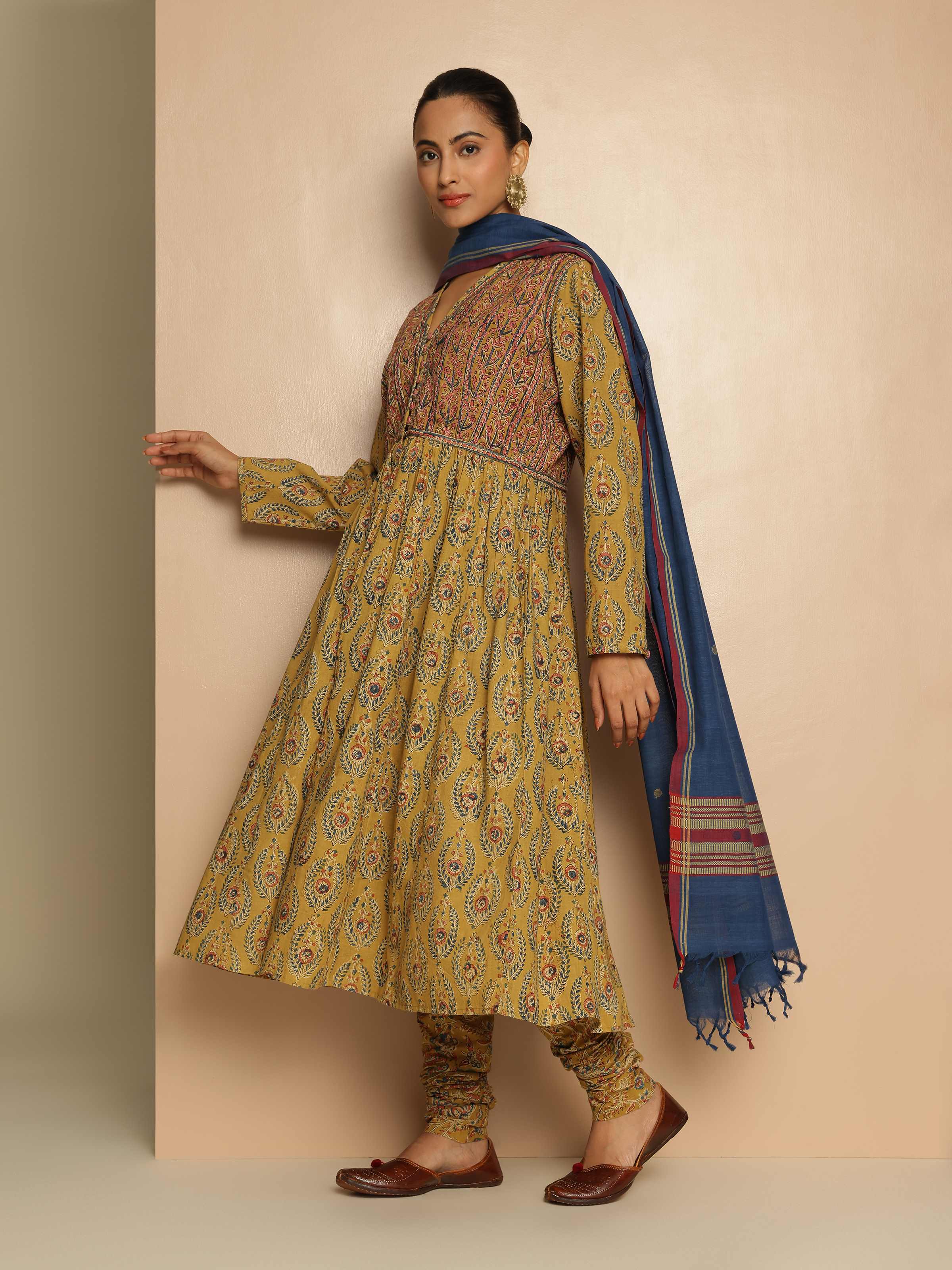 Side view of Yellow Cotton Kalamkari Block Printed Churidaar highlighting detailed block print patterns on cotton.