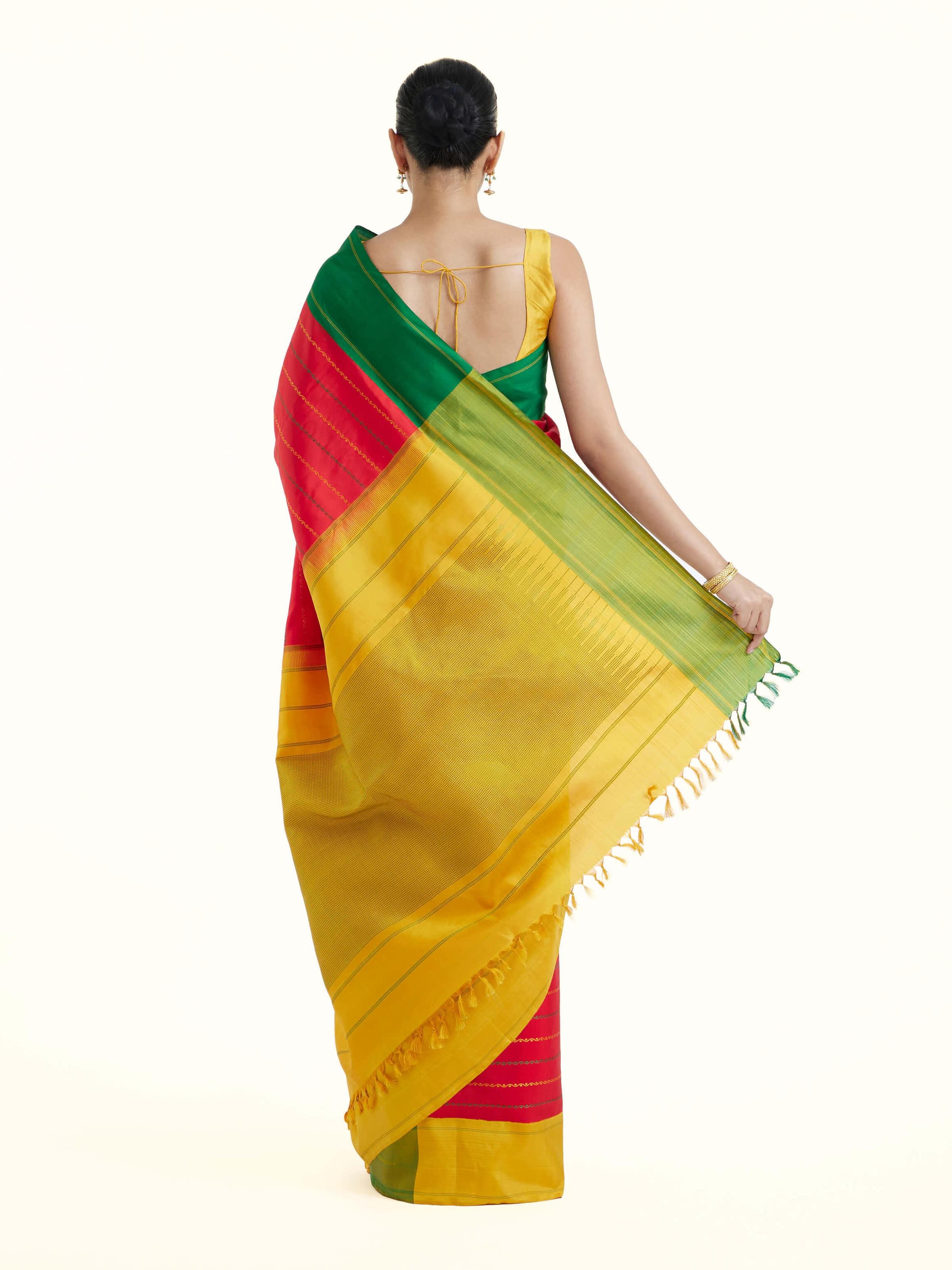 Back view of red silk Kancheepuram saree displaying full pallu design