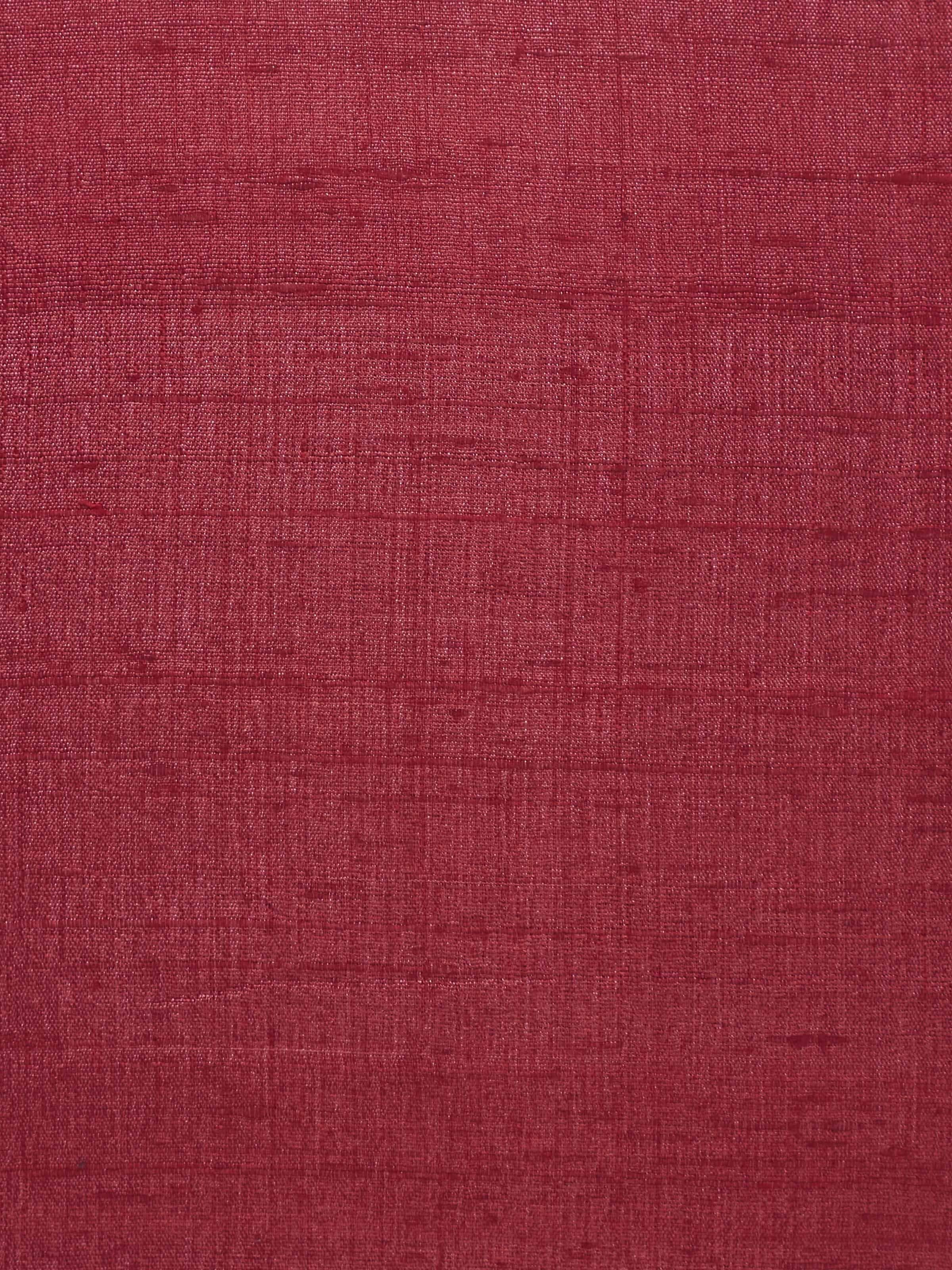 Close-up detail of Alankar cushion showing embroidery threads and rich silk texture