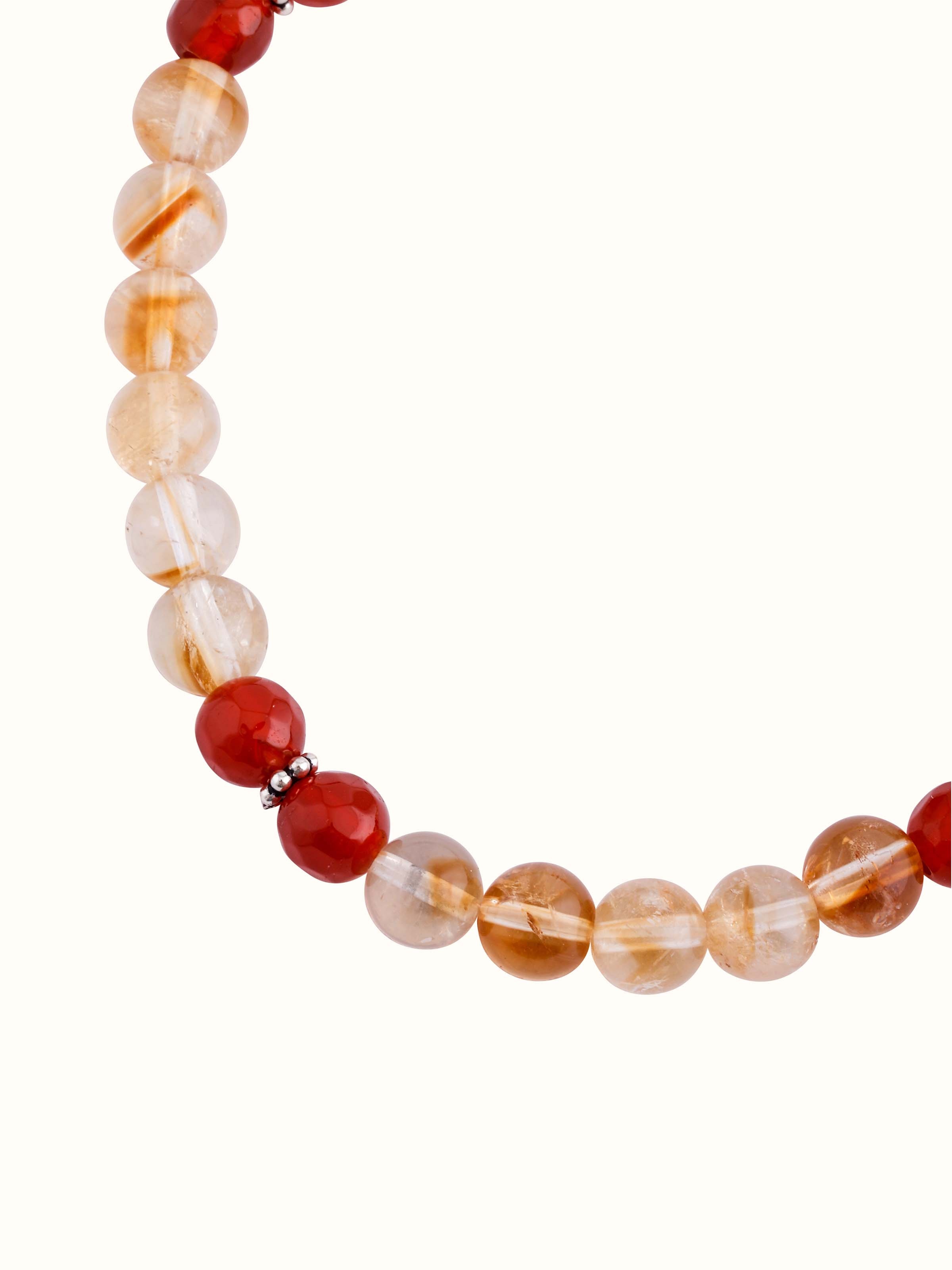 Top view of Carnelian, Citrine Bracelet focusing on contrast between deep carnelian and bright citrine