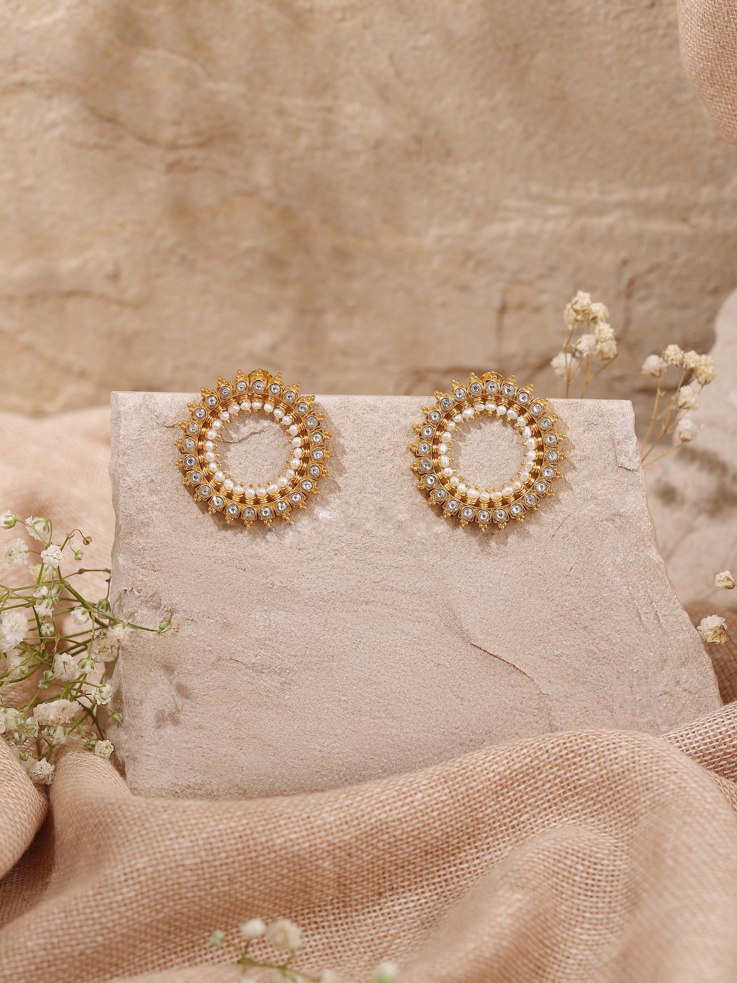 Lifestyle view of Guttapusalu pearl silver studs paired with ethnic outfit for a festive look.
