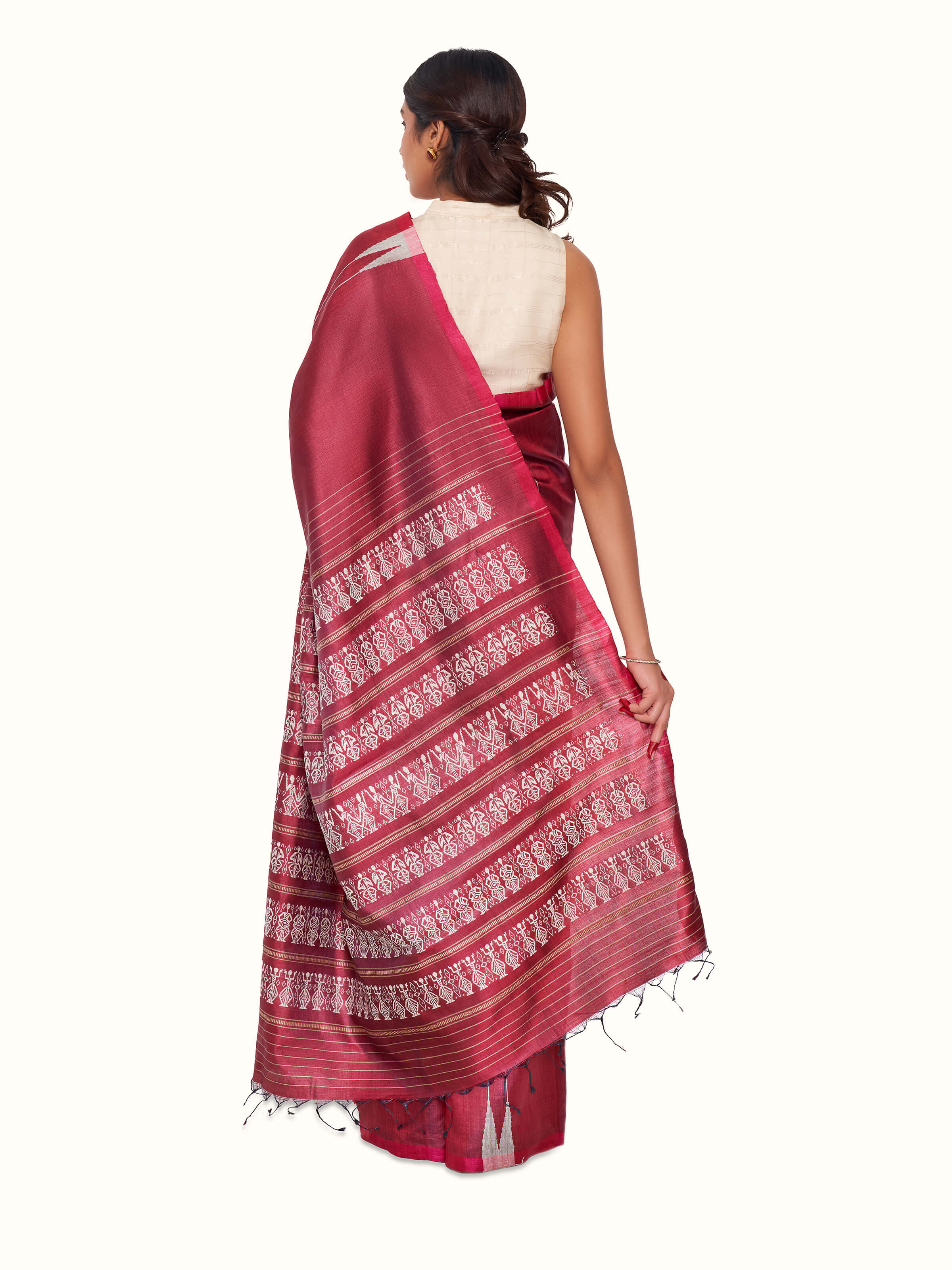 Back view of maroon tussar silk Odisha ikat saree displaying pallu design