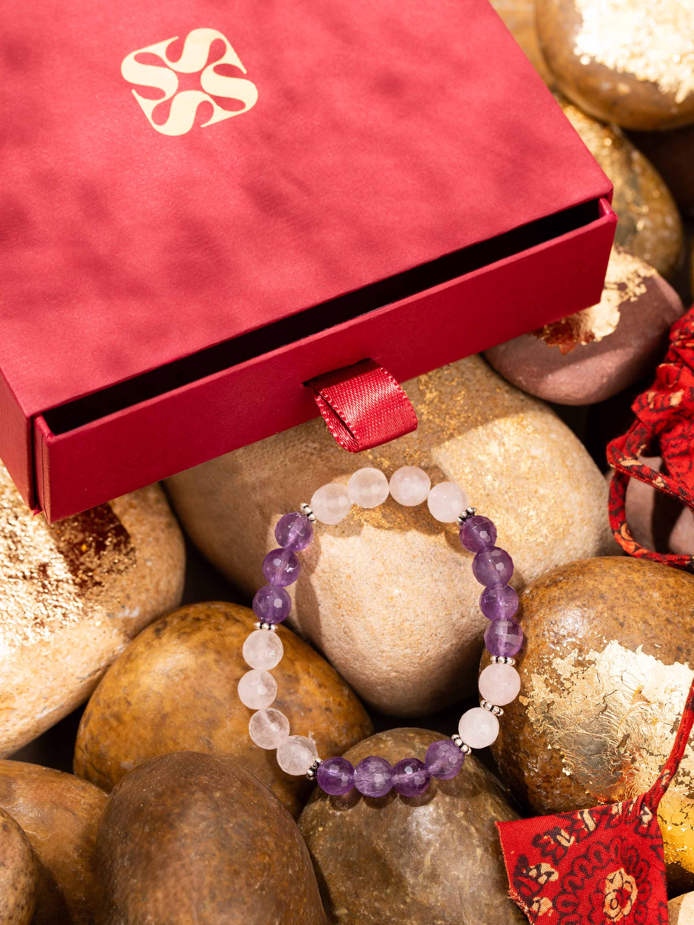 Close-up view of Amethyst & Rose Quartz Silver Bracelet showcasing the subtle pink and purple crystal textures