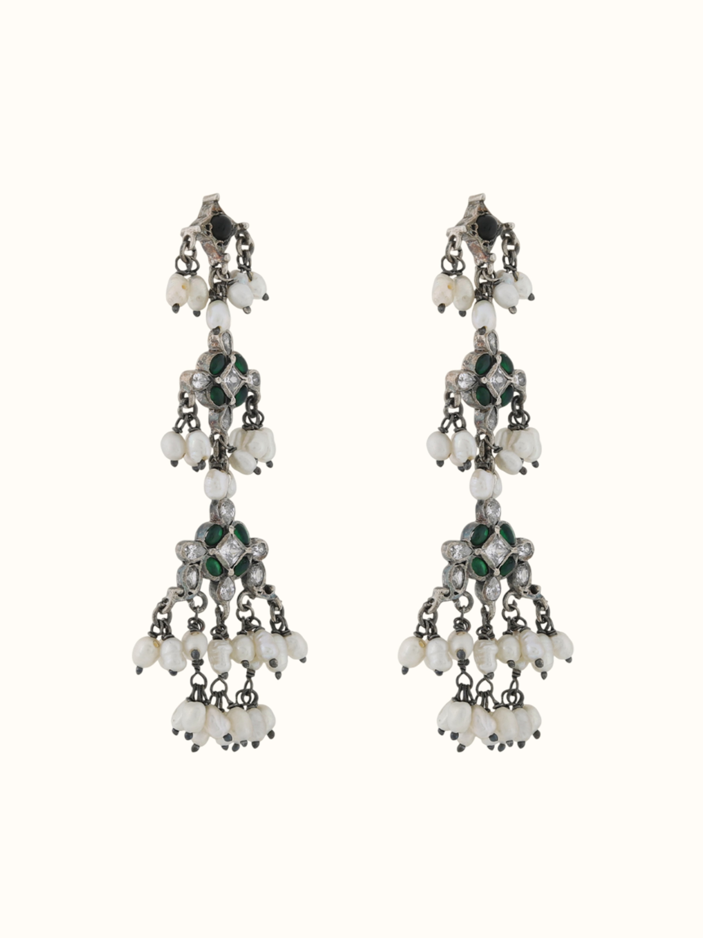 Angled view highlighting the dimensional craftsmanship and delicate embellishments