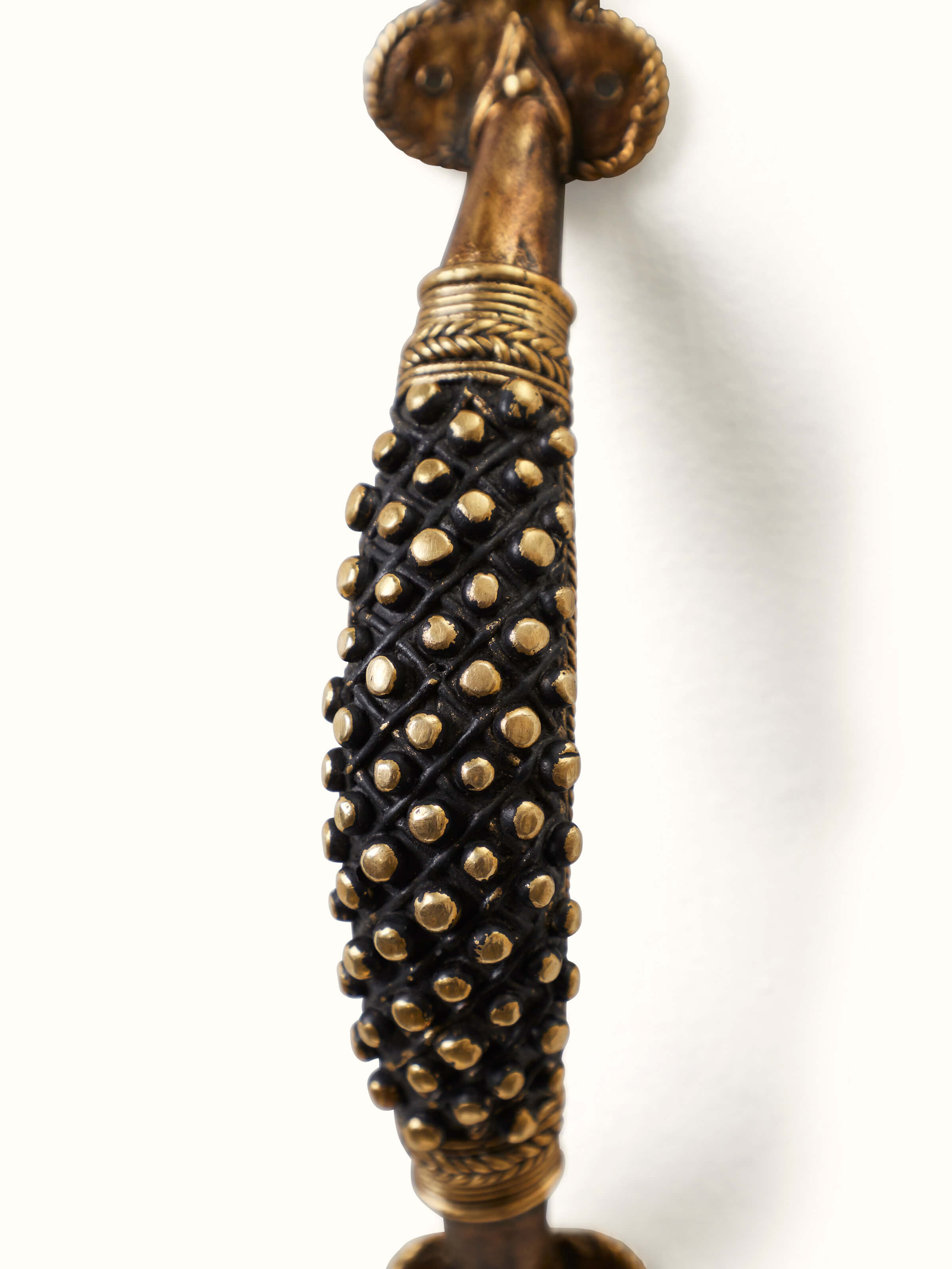Close-up view of Dhokra Brass Small Balls Door Handle focusing on the fine brass work and decorative pattern