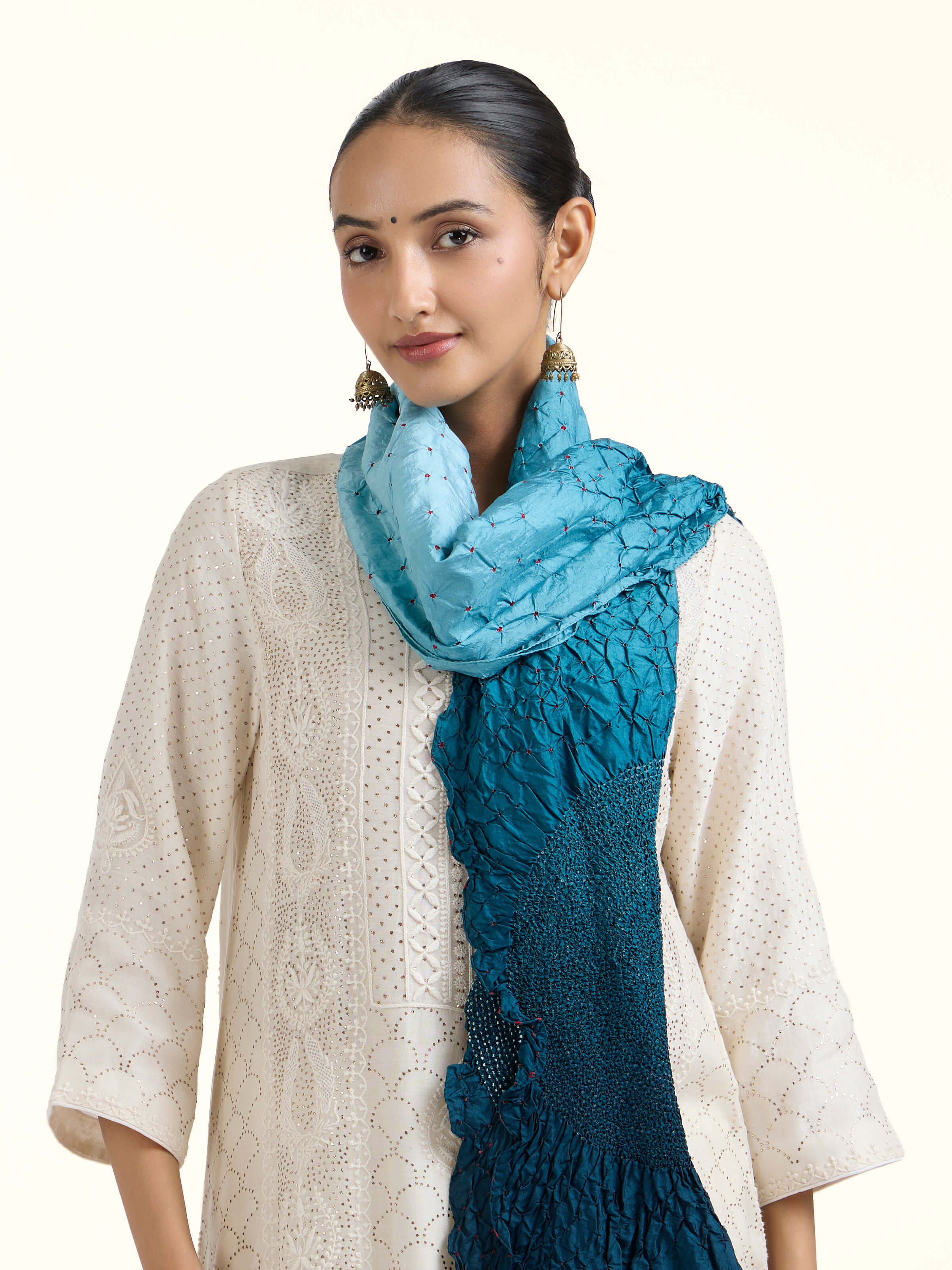 Angled view of Teal Bandhani Tie & Dye Silk Stole revealing the depth of its color and intricate pattern