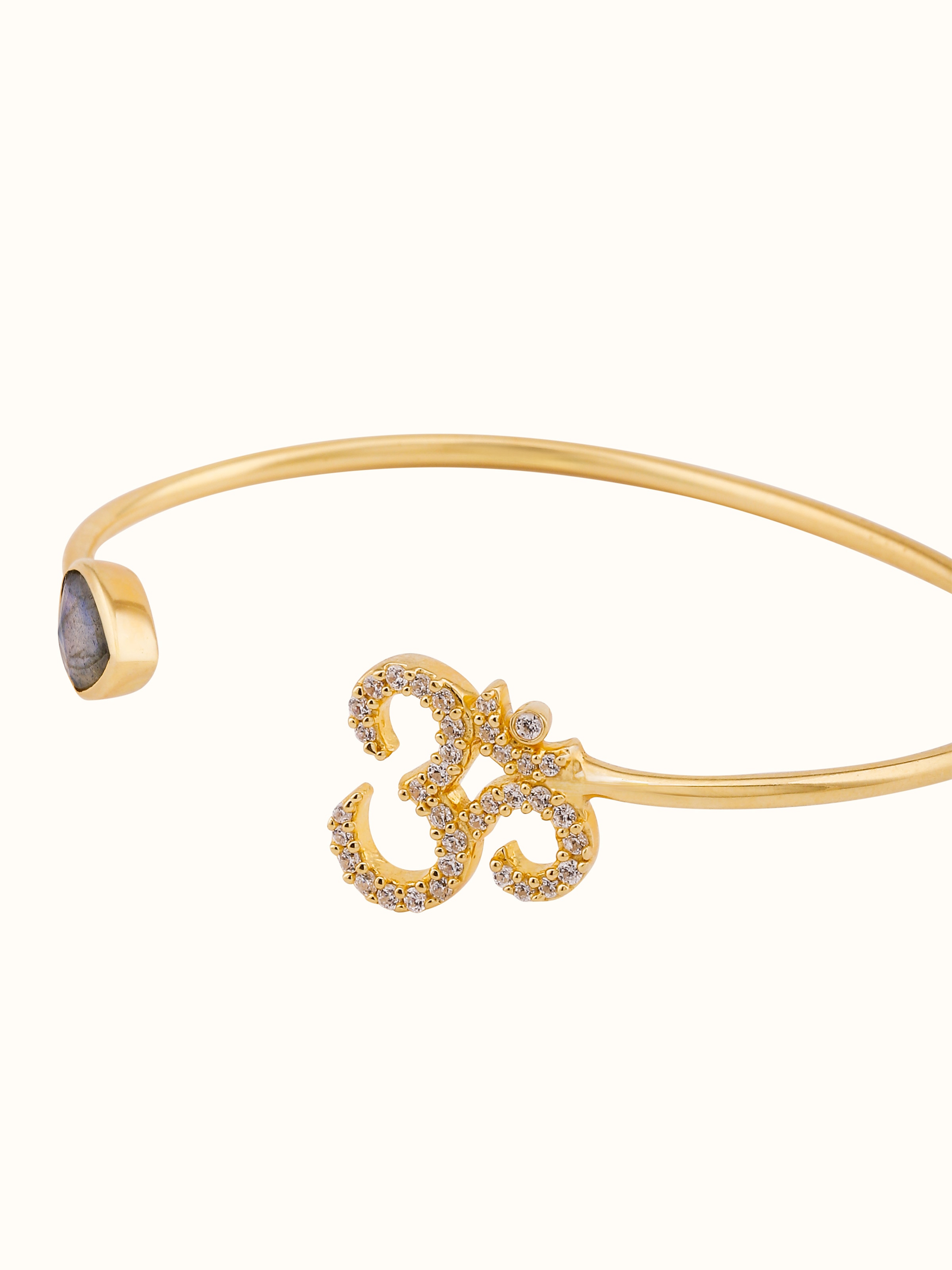 Overhead view of Labradorite & Om Bracelet, displaying its elegant layout and spiritual aesthetic