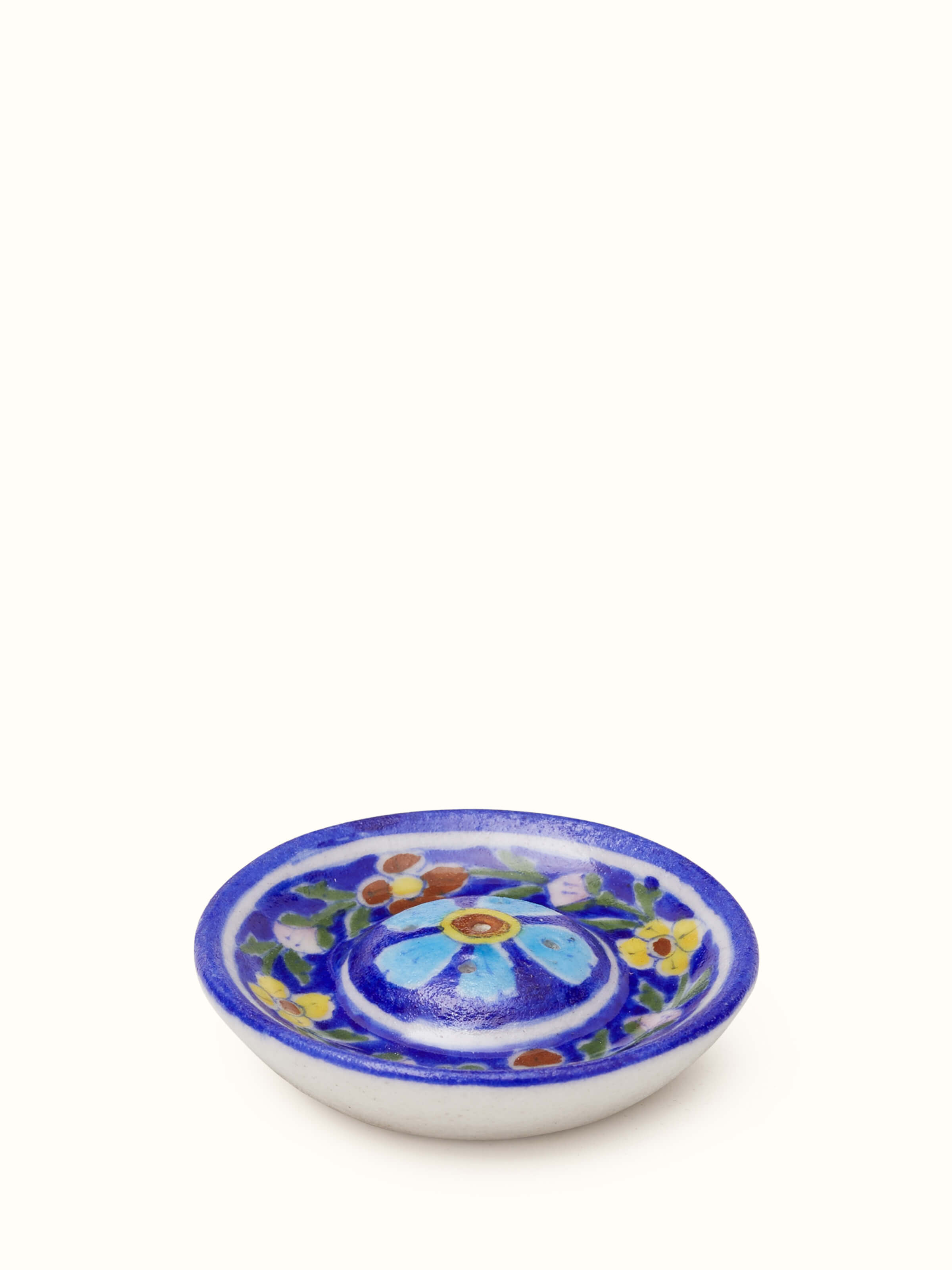 Top view of blue pottery ceramic floral incense stick holder