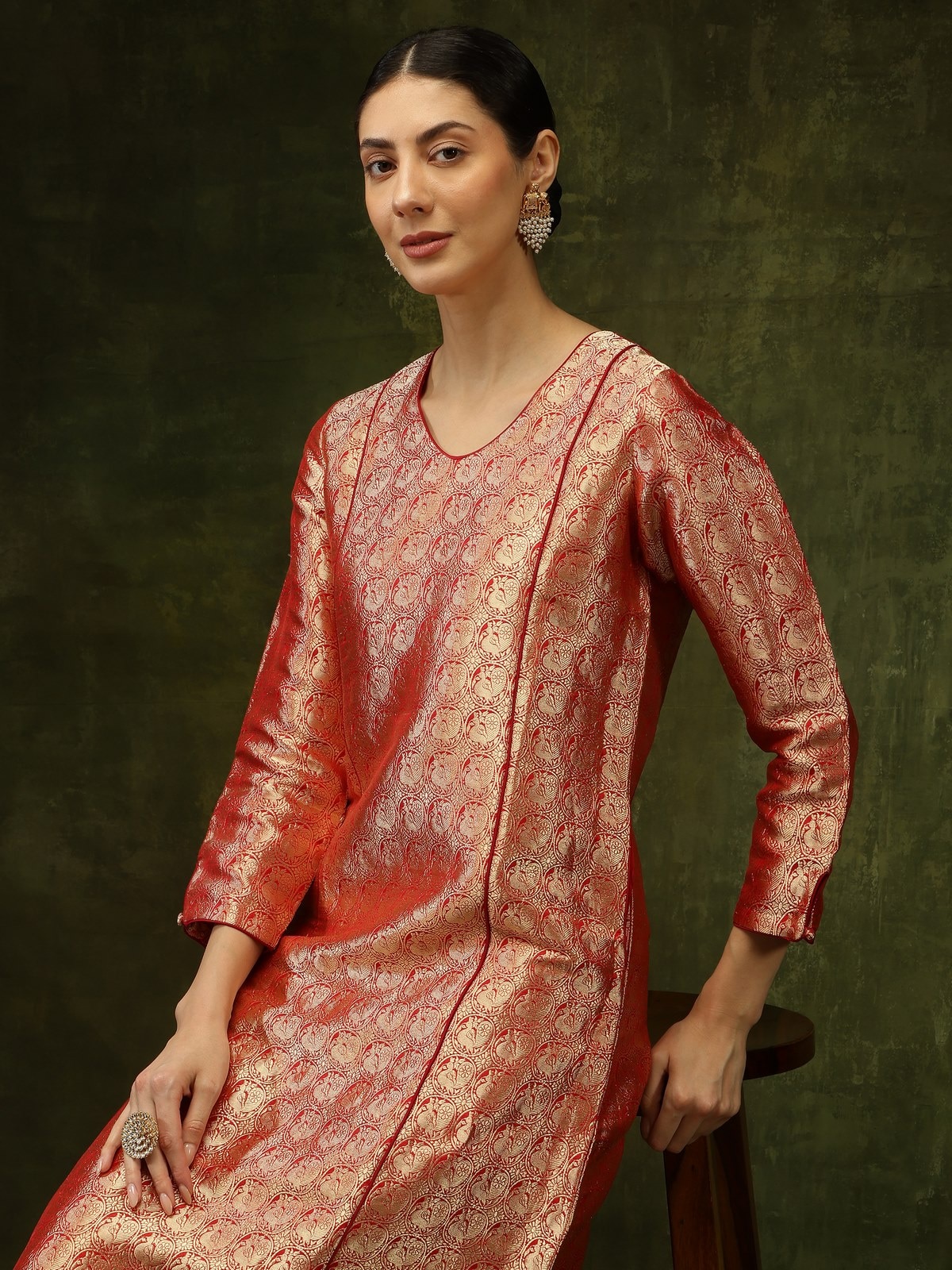 Model walking in Red Silk Banarasi Kurta, capturing the garment’s elegant movement and woven design.