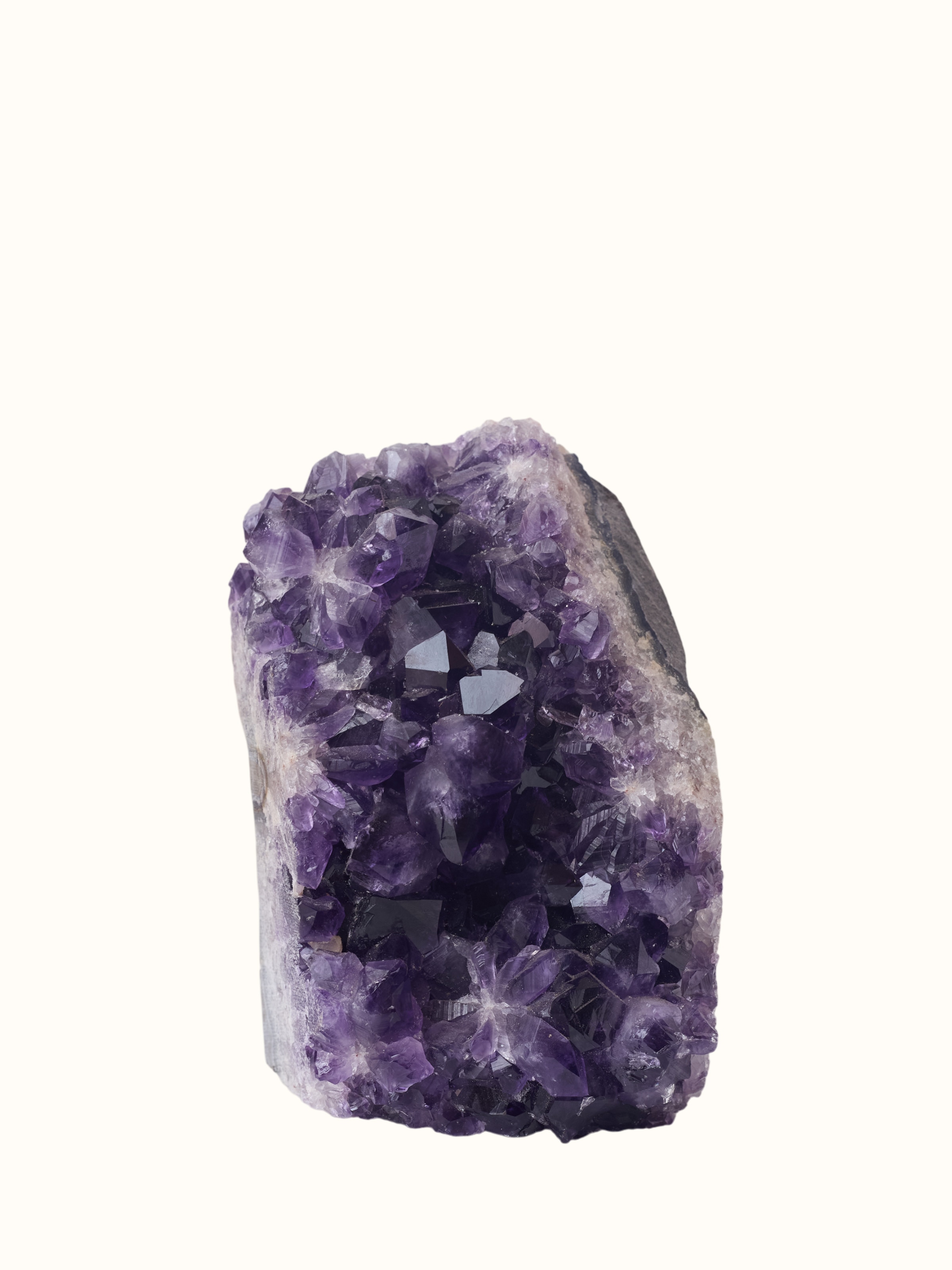 Side-angle view of the Gemstone Amethyst Short Geode Healing Stone